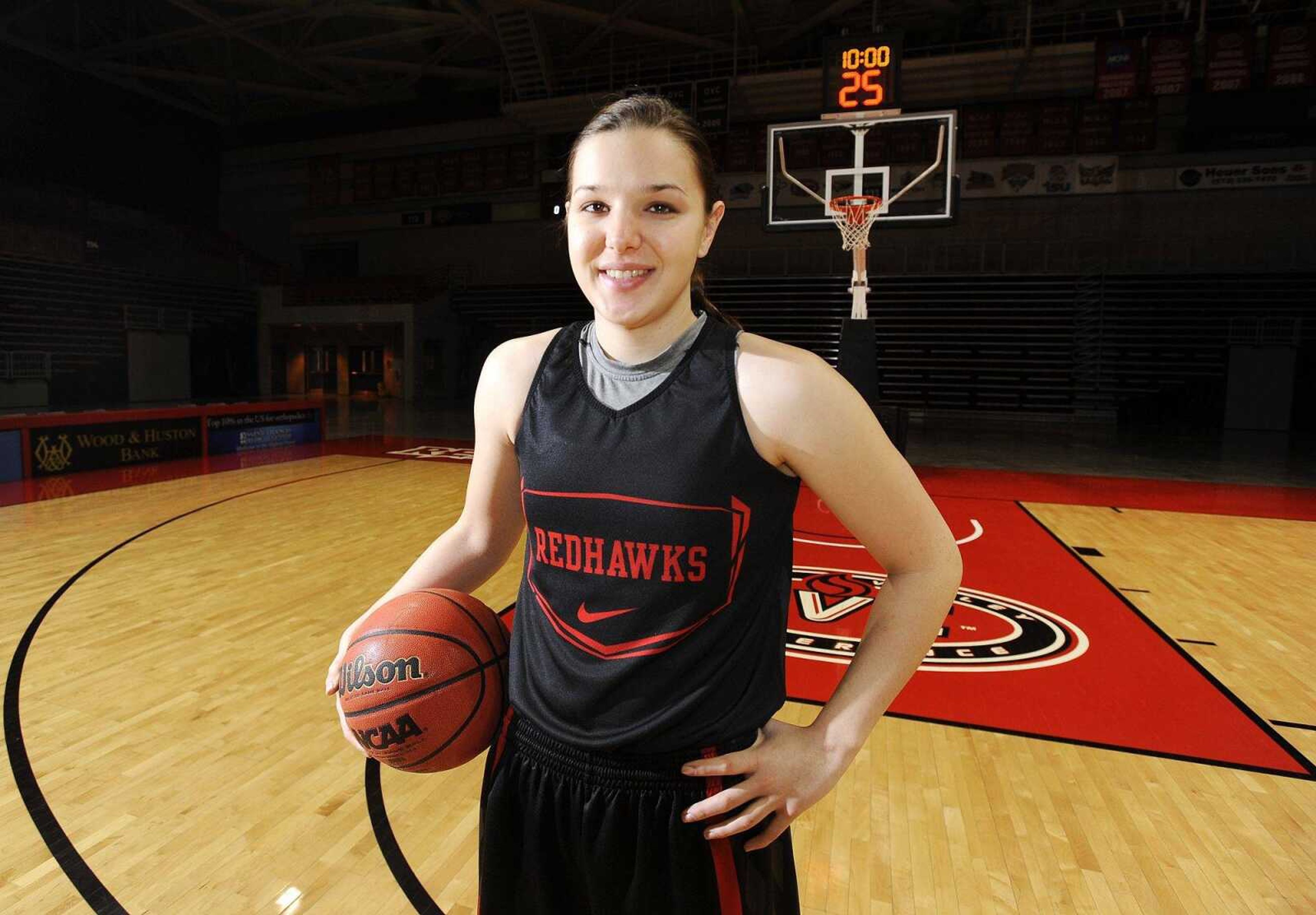 Southeast Missouri State University's Ashton Luttrull poses for a photo on the Redhawks  court inside the Show Me Center, Tuesday, Jan. 12, 2016. (Laura Simon)