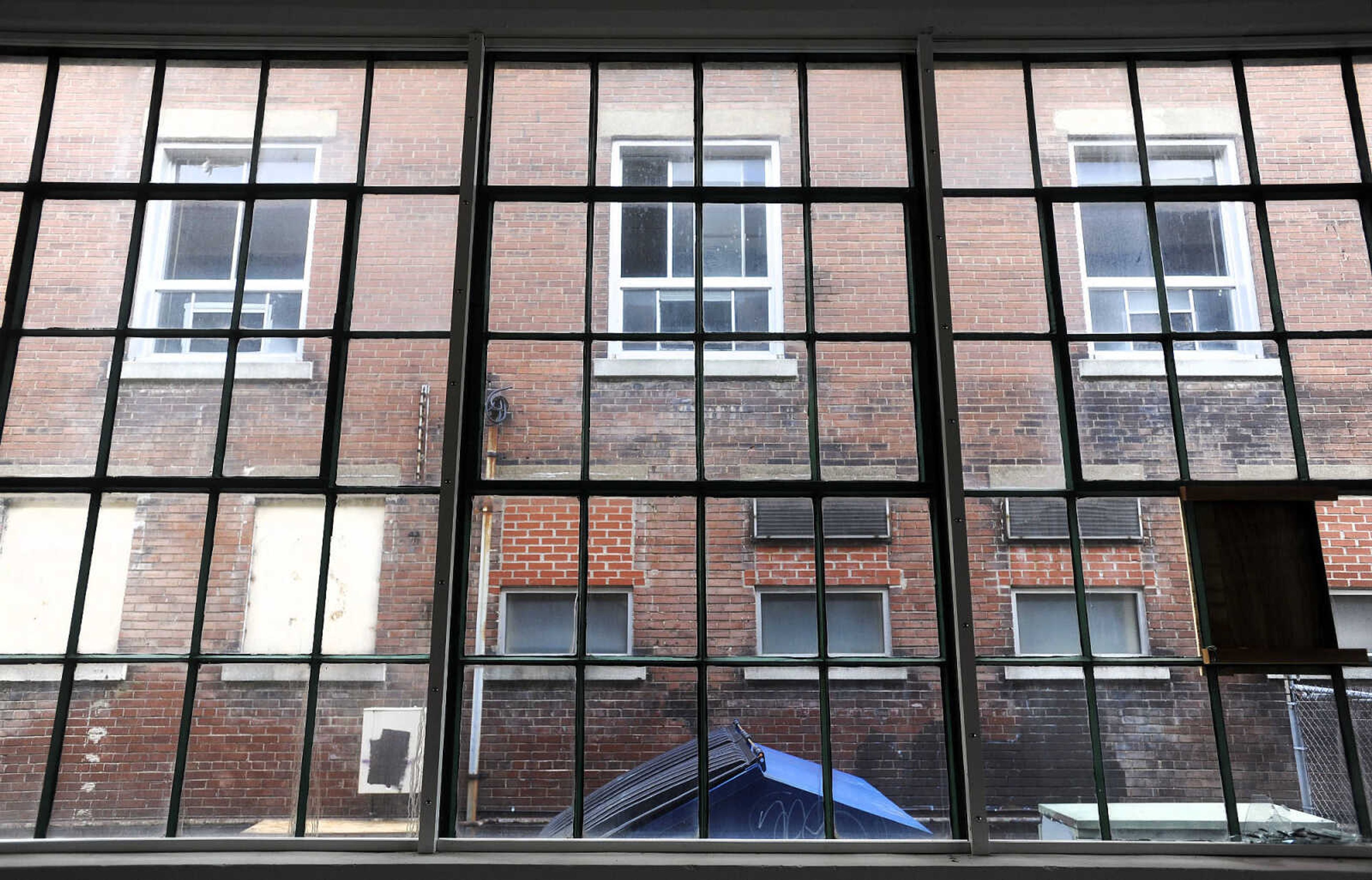 LAURA SIMON ~ lsimon@semissourian.com

The backside of the H-H Building is seen through the windows of the Marquette Center on Friday, April 8, 2016, in Cape Girardeau.