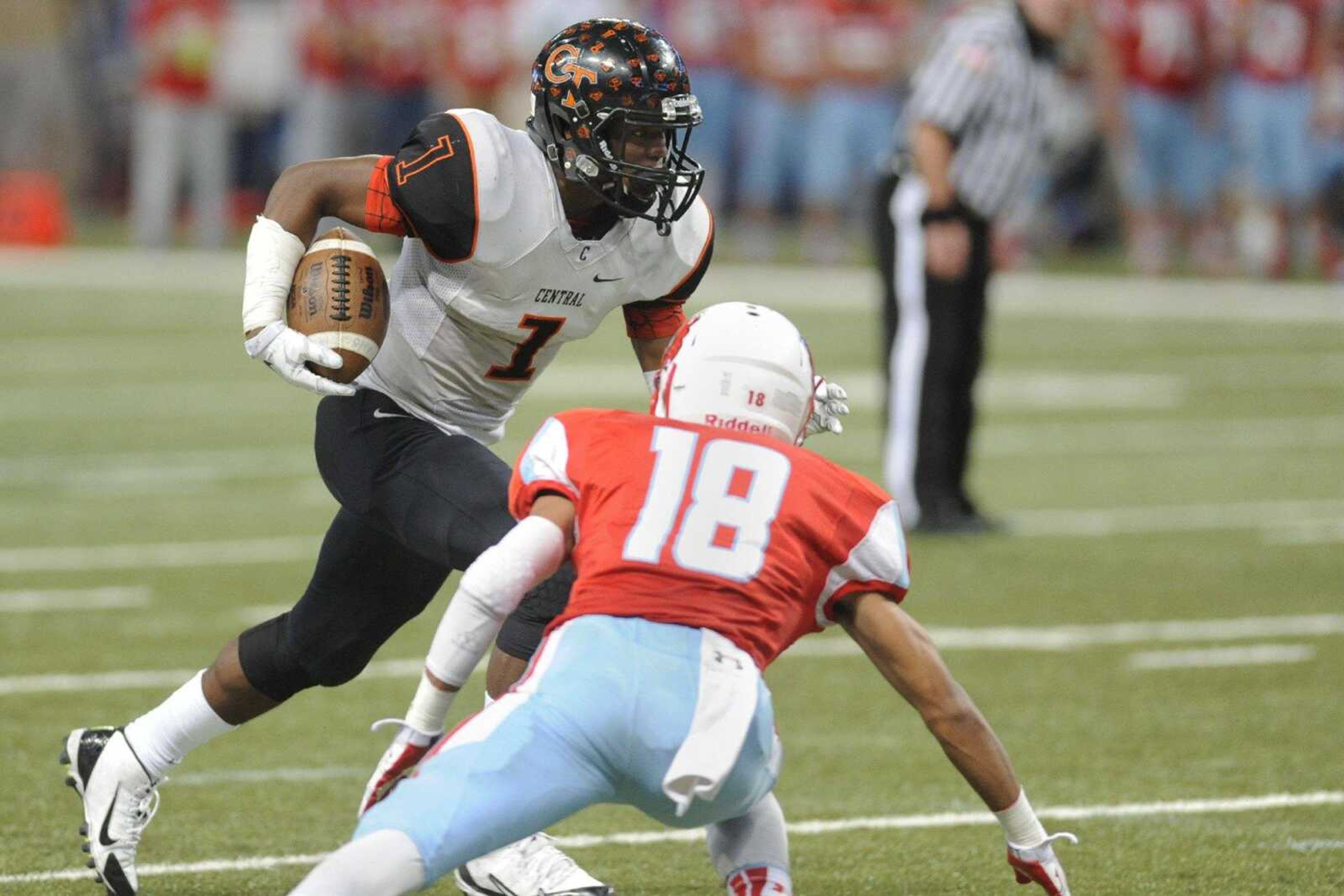 Central's Al Young carries against Webb City during the Class 4 state championship game last year at the Edward Jones Dome in St. Louis. The two teams meet again in the state semifinals Saturday at Central High School. (Glenn Landberg)