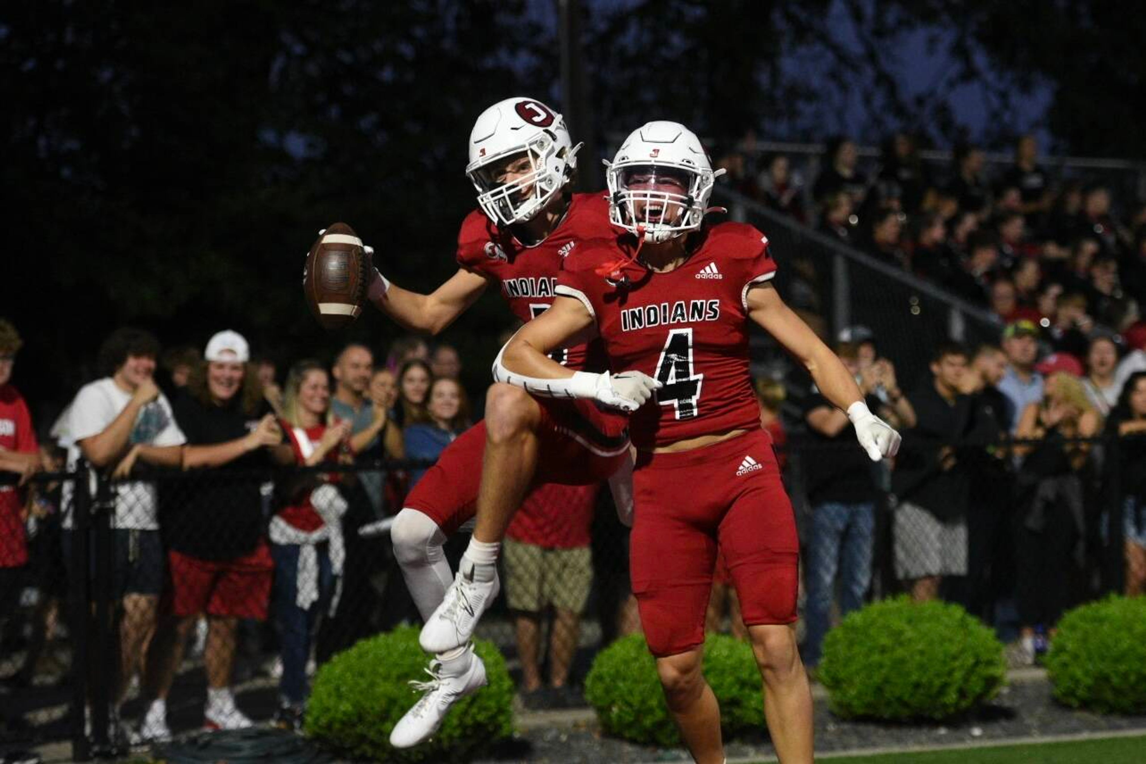 Jackson's Kai Crowe (right) celebrates with Blayne Harris after Harris' touchdown grab during the Indians' 50-0 win over Cape Central at Jackson High School in 2023. The teams will square off Friday night, Oct. 4.
