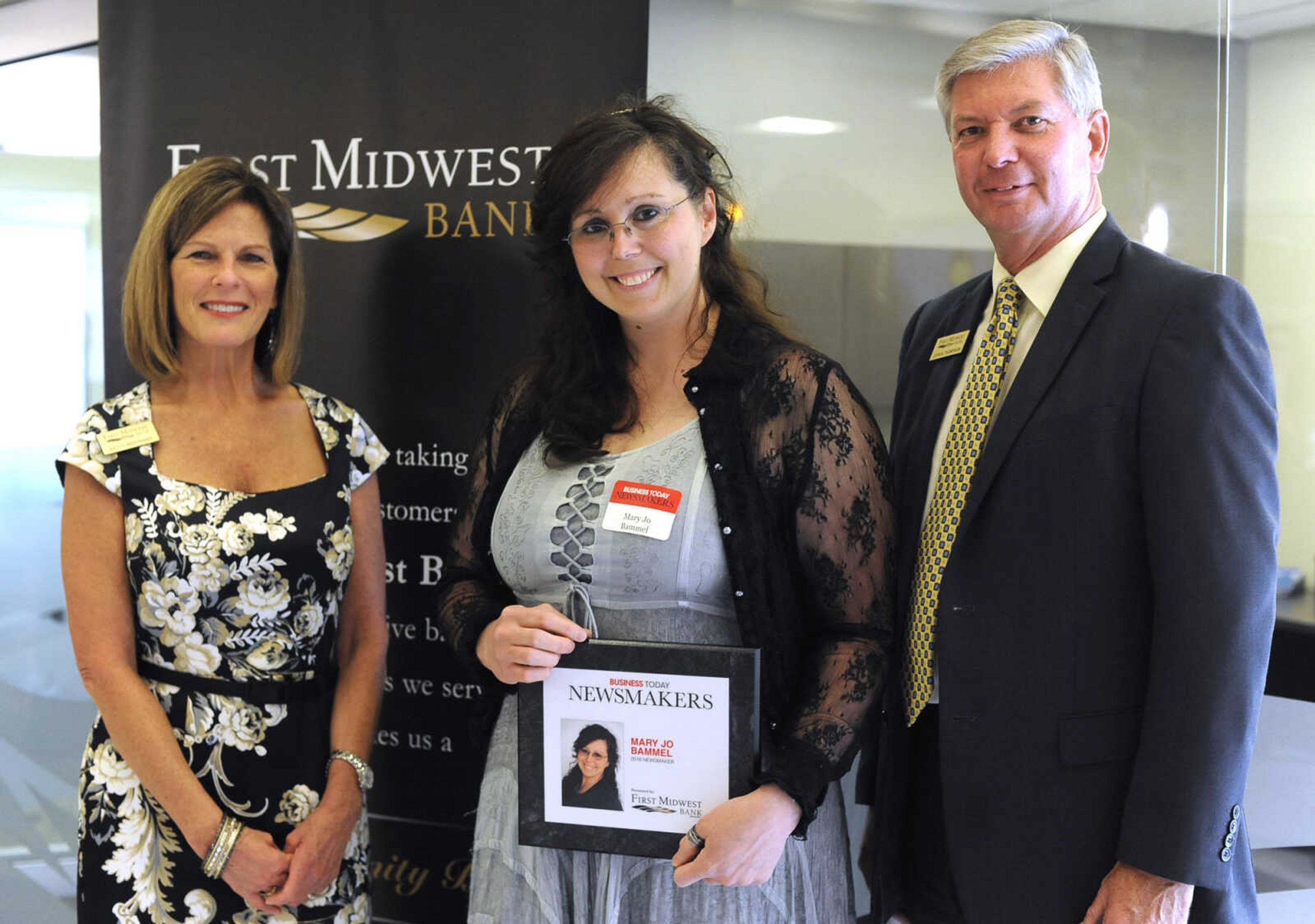 Mary Jo Bammel poses for a photo with Kathy Bertrand, First Midwest Bank community bank president, Cape Girardeau, and John N. Thompson, First Midwest Bank community bank president, Jackson, Wednesday, Sept. 7, 2016 during the Business Today Newsmakers awards reception at First Midwest Bank in Cape Girardeau.