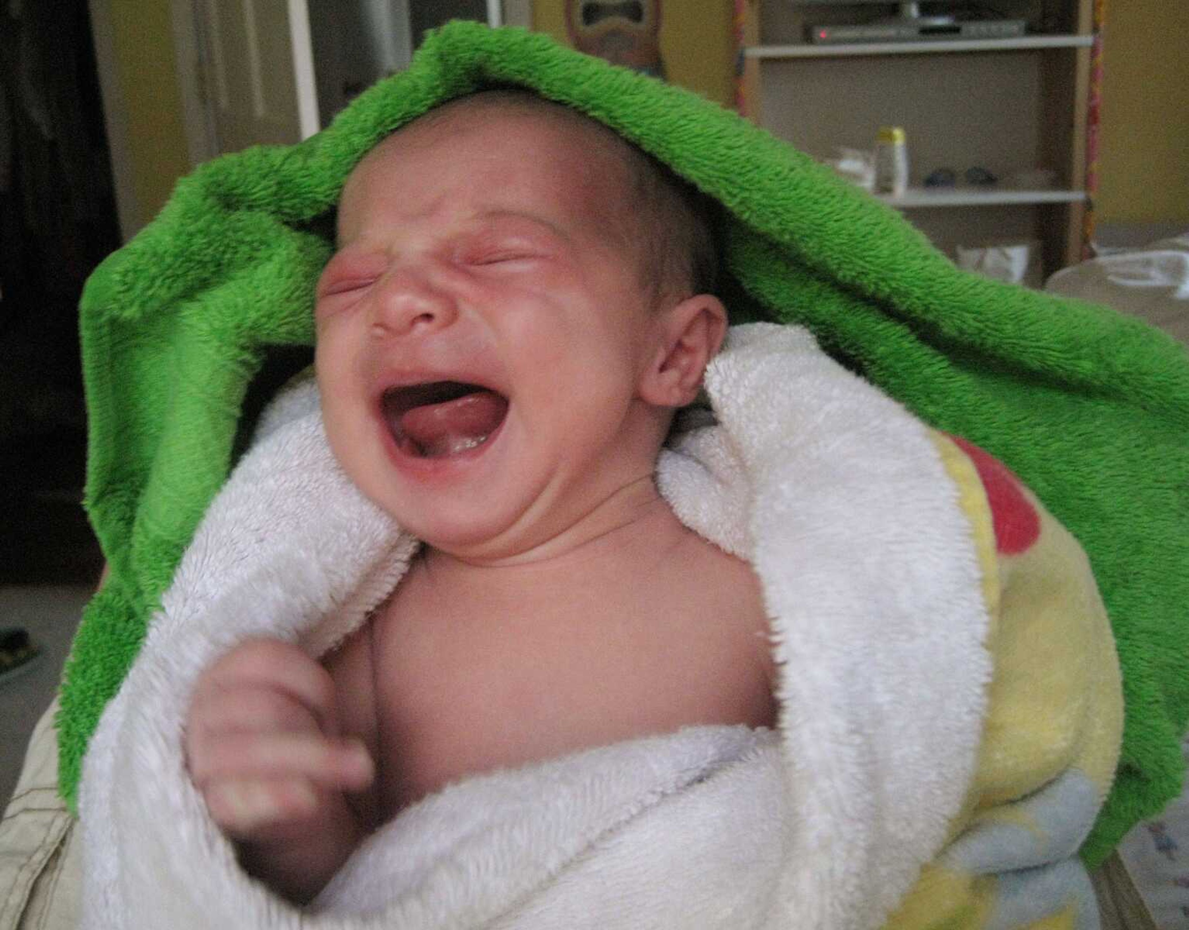 In this July 2009 family photo provided by her father Rodney, Roxy Sterbenz is seen crying at her home in Queens, N.Y. New parents will try almost anything to quiet fussy babies with colic, but a review of medical literature says there's little evidence that popular folk remedies work. (Associated Press photo)