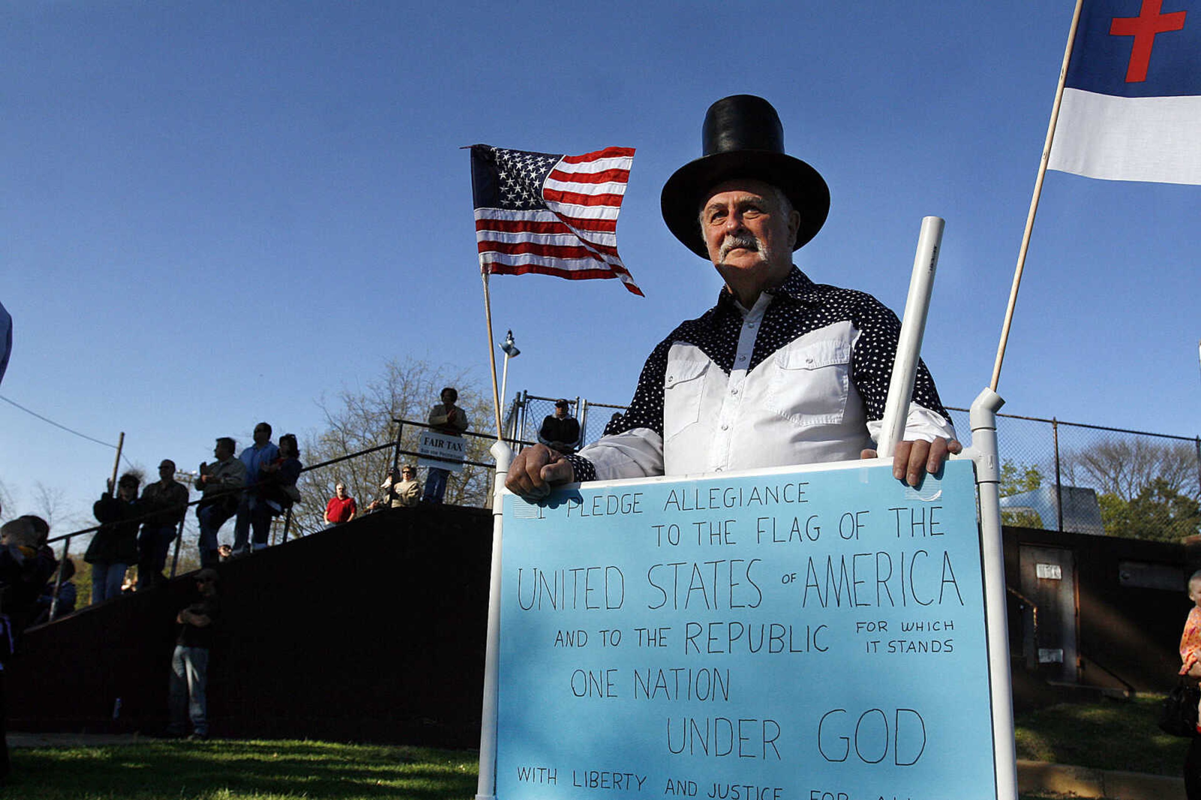 ELIZABETH DODD ~ edodd@semissourian.com
Richard Krueger of Cape Girardeau joins the Cape Girardeau "tea party" tax protest April 15 at Capaha Park.