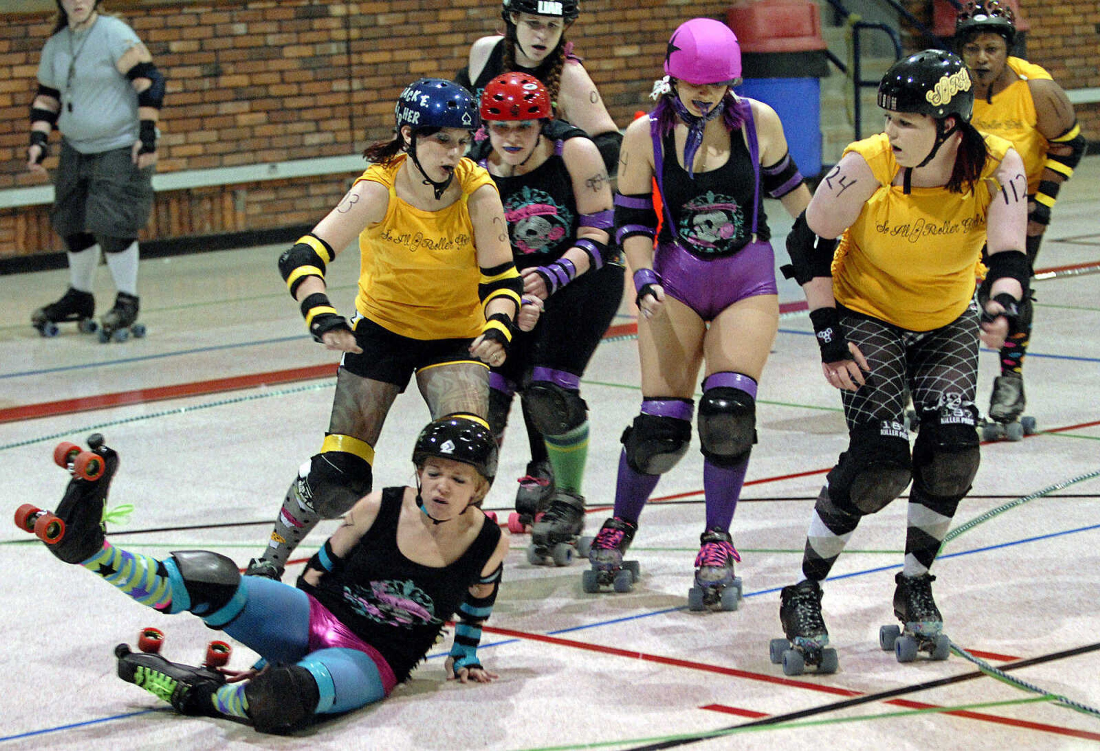 LAURA SIMON~lsimon@semissourian.com
The Cape Girardeau Roller Girls take on the Southern Illinois Roller Girls Saturday, February 26, 2011 during  Riot at the CG Corral at the A.C. Brase Arena Building in Cape Girardeau. A portion of the event proceeds go to benefit Safe Harbor Animal Shelter. The CGRG bout will be March 12, 2011 against the Circle City Crashers at the Arena Building.