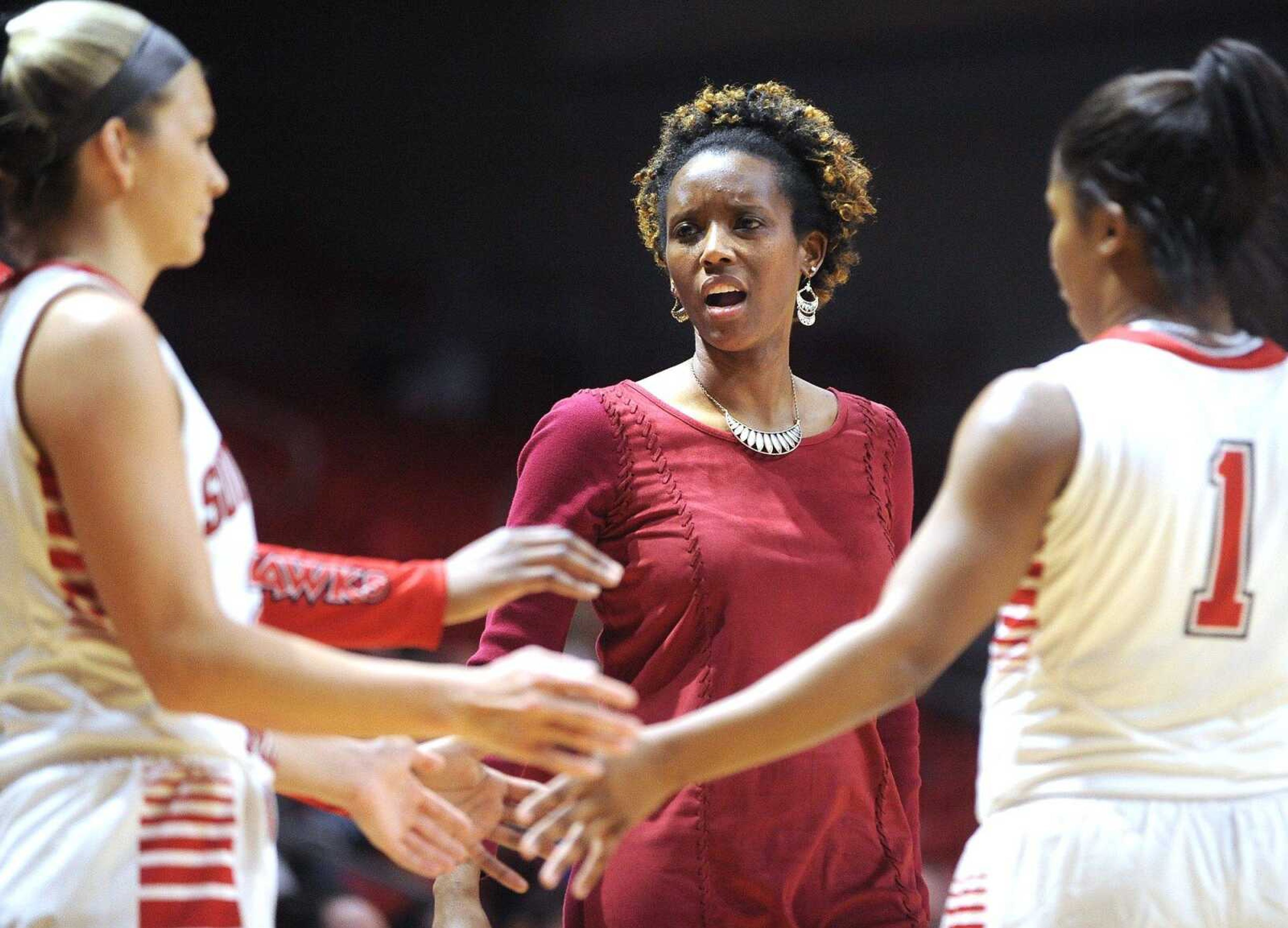 Southeast Missouri State coach Rekha Patterson talks to her team during a timeout in the third quarter.