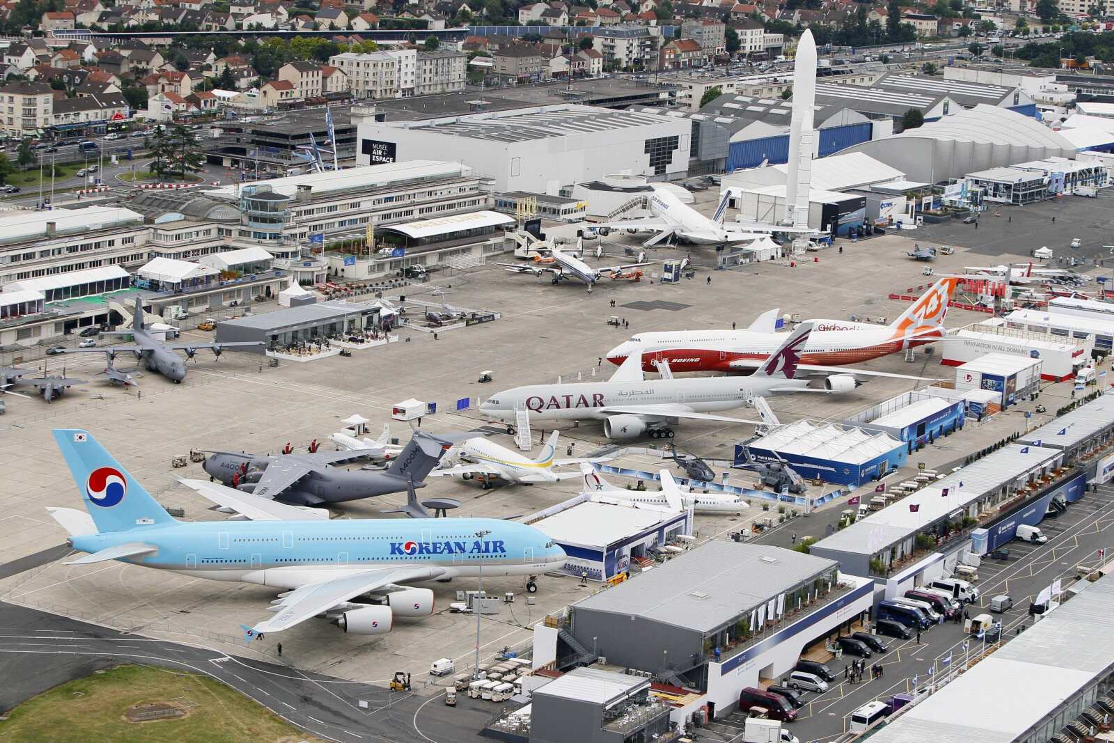 Francois Mori ~ Associated PressAn aerial view of the Airbus A380 of Korean Airlines, at left, with other aircrafts on Monday, the first day of the 49th Paris Air Show at le Bourget airport east of Paris.