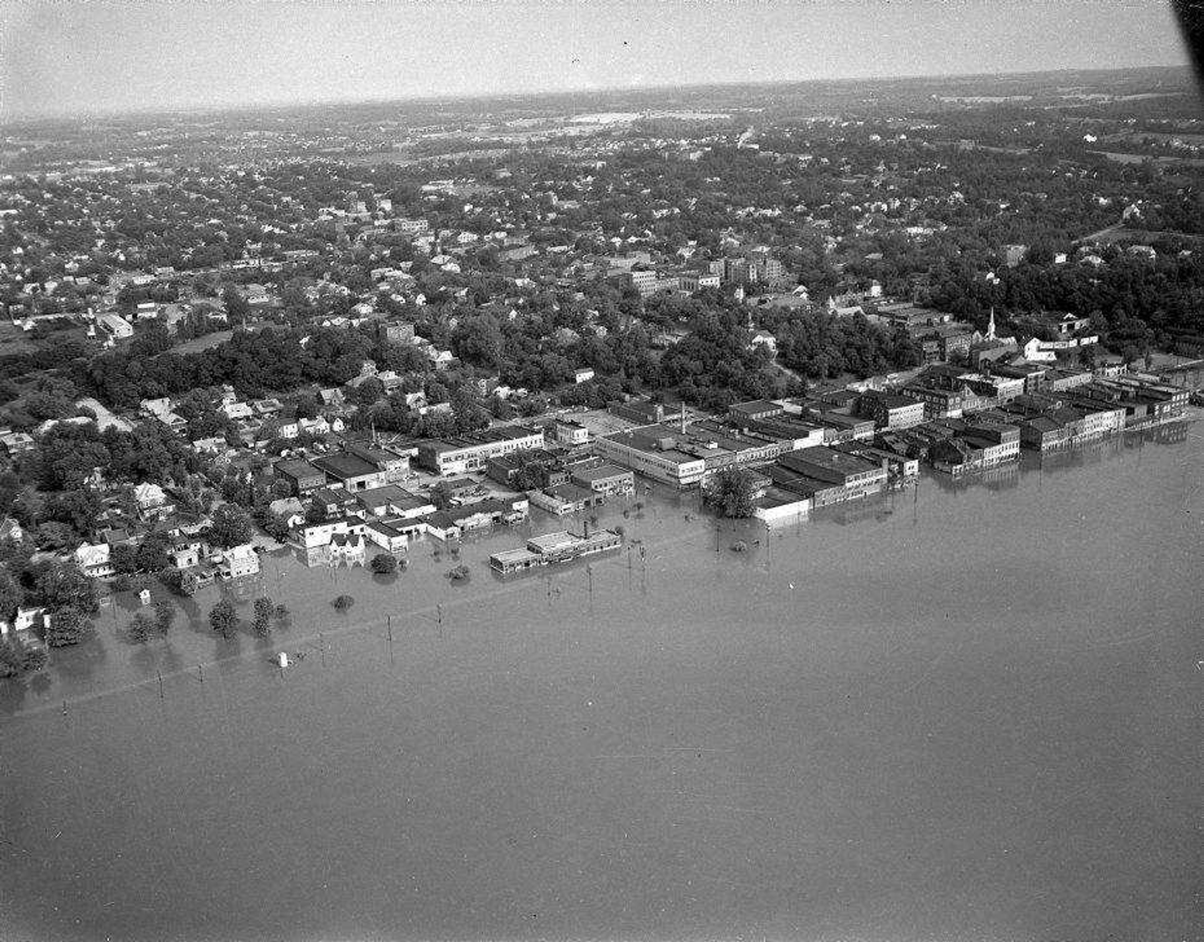 A flood in downtown Cape Girardeau is shown before the floodwall was built. Today is the 50th anniversary of the closing of the final gap in the floodwall. (Southeast Missourian archive)