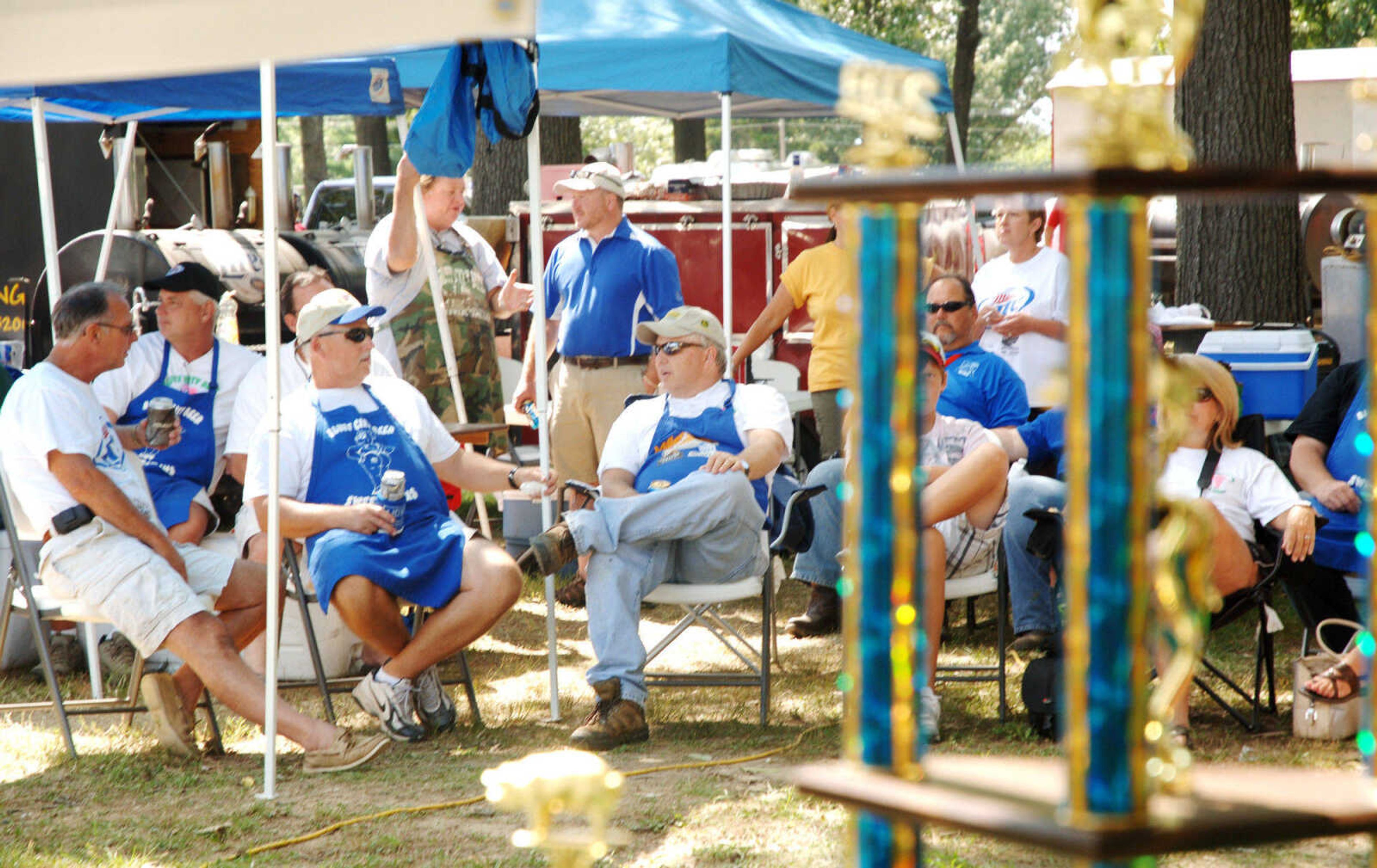 Contestants await the awards ceremony at the Cape BBQ Fest Saturday, August 22, 2009, at Arena Park.