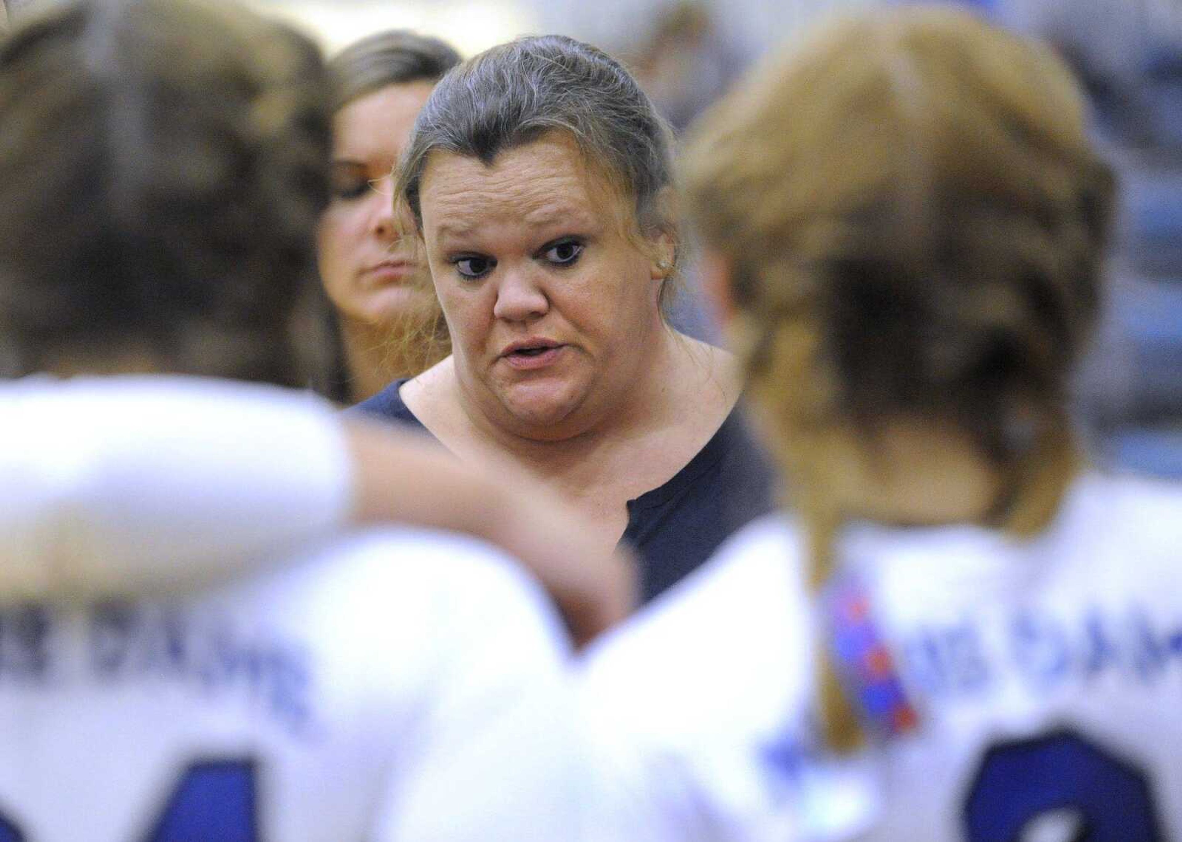 Notre Dame coach Tara Stroup talks to her team between sets against Farmington Thursday, Aug. 25, 2016 at Notre Dame Regional High School.