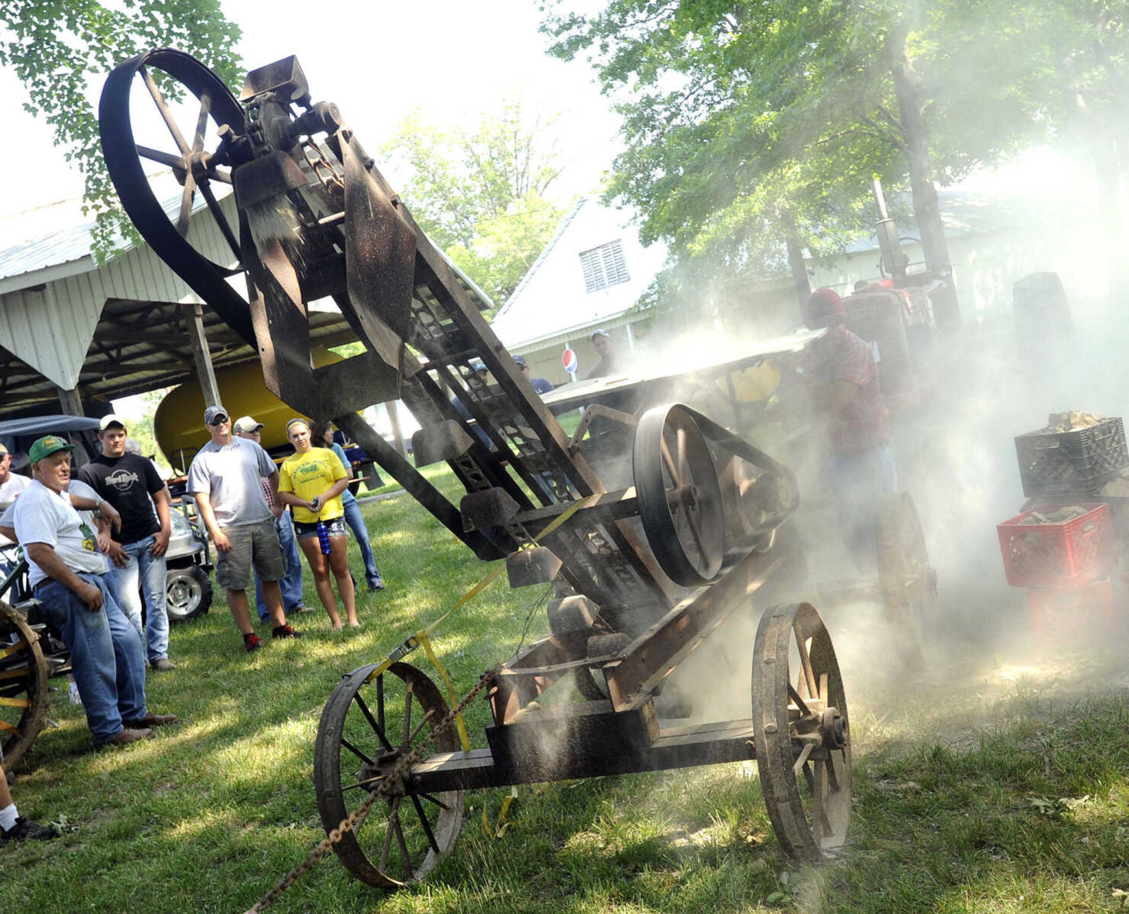 Leroy Fritsche demonstrates his rock crusher Saturday at Old Timers' Day in Perryville, Mo.