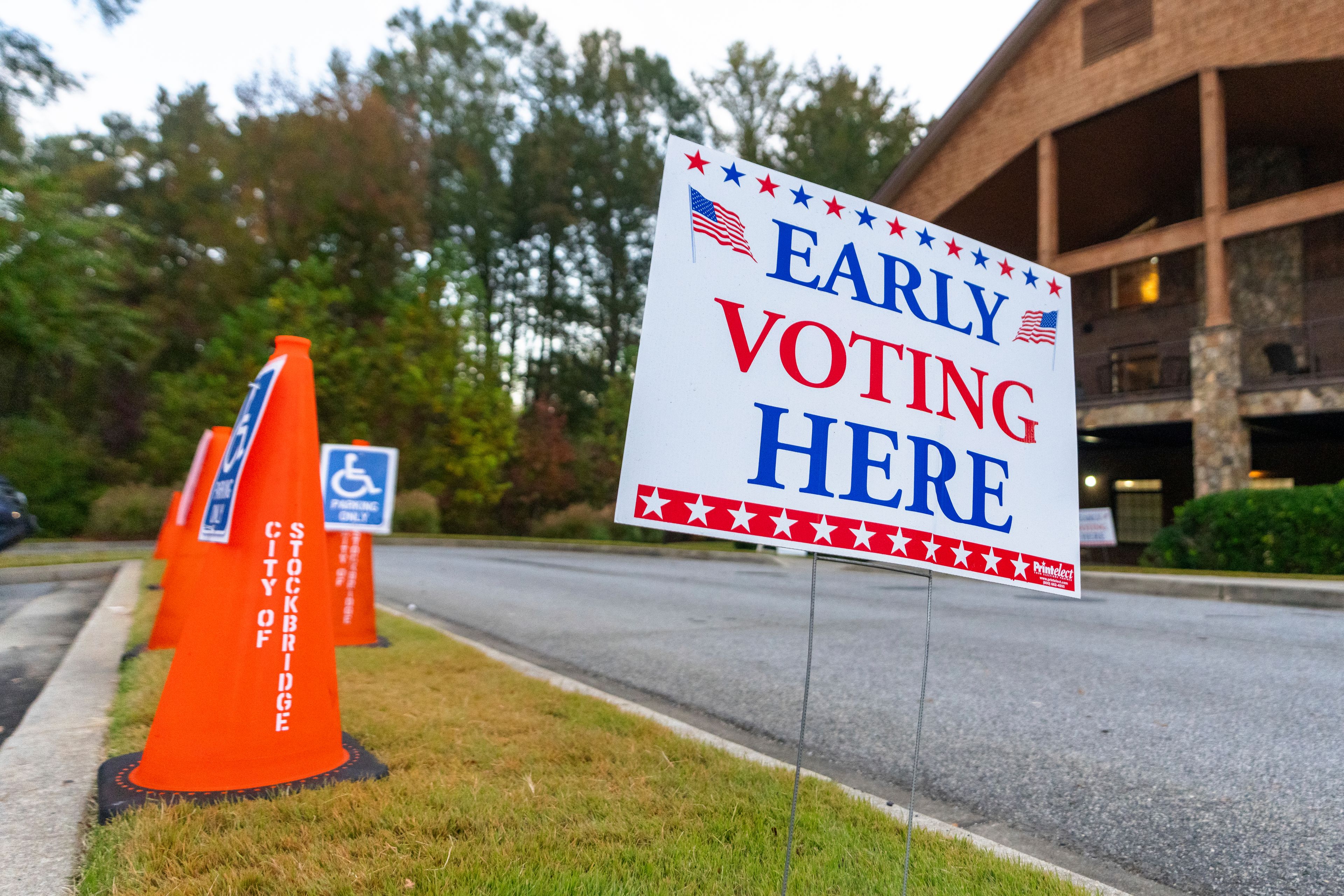 An Early Voting sign is seen outside of a polling station, Thursday, Oct. 31, 2024, in Stockbridge, Ga. (AP Photo/Jason Allen)