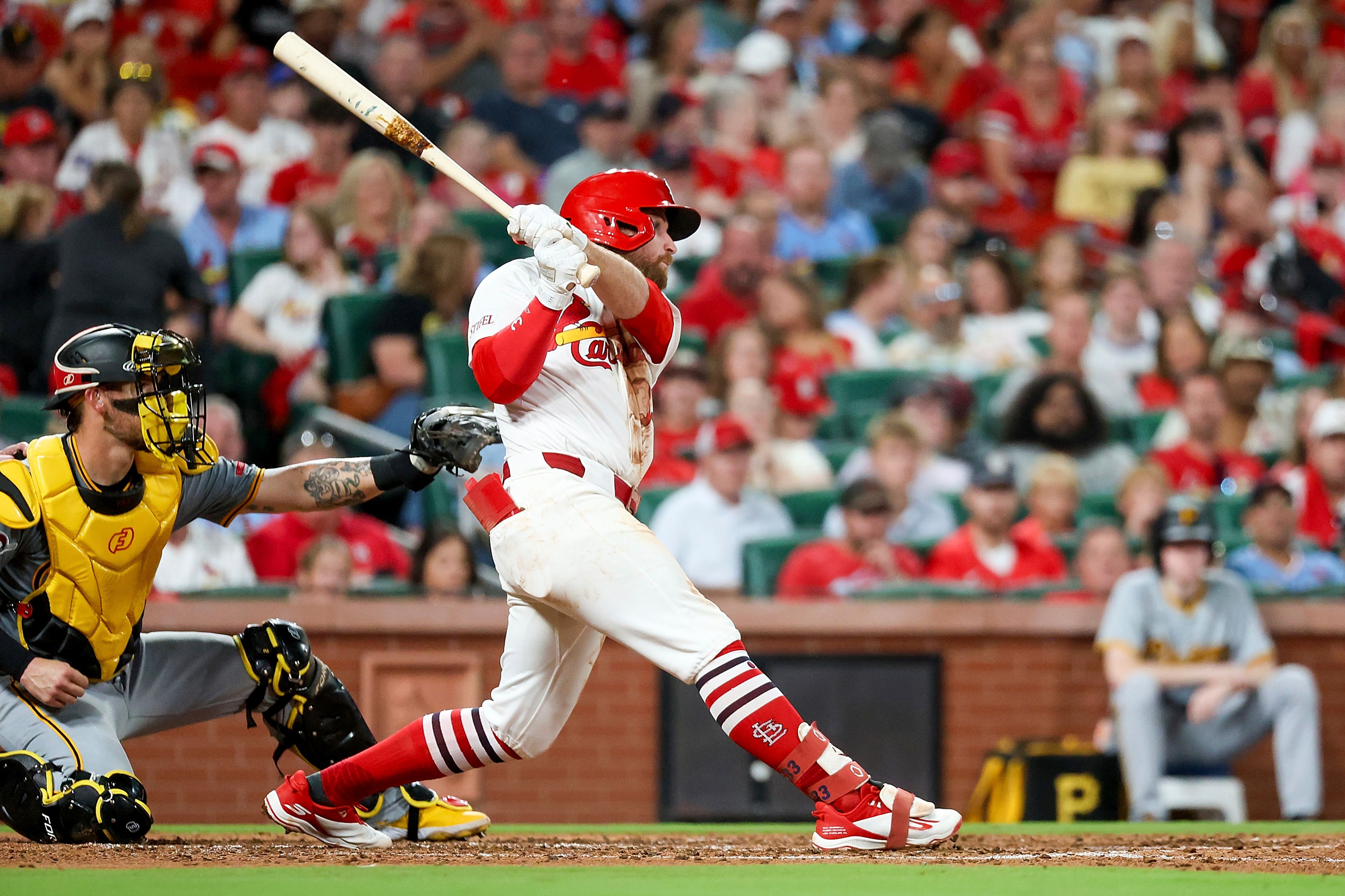 St. Louis Cardinals' Brendan Donovan hits an RBI double during the sixth inning of a baseball game against the Pittsburgh Pirates, Thursday, Sept. 19, 2024, in St. Louis. (AP Photo/Scott Kane)