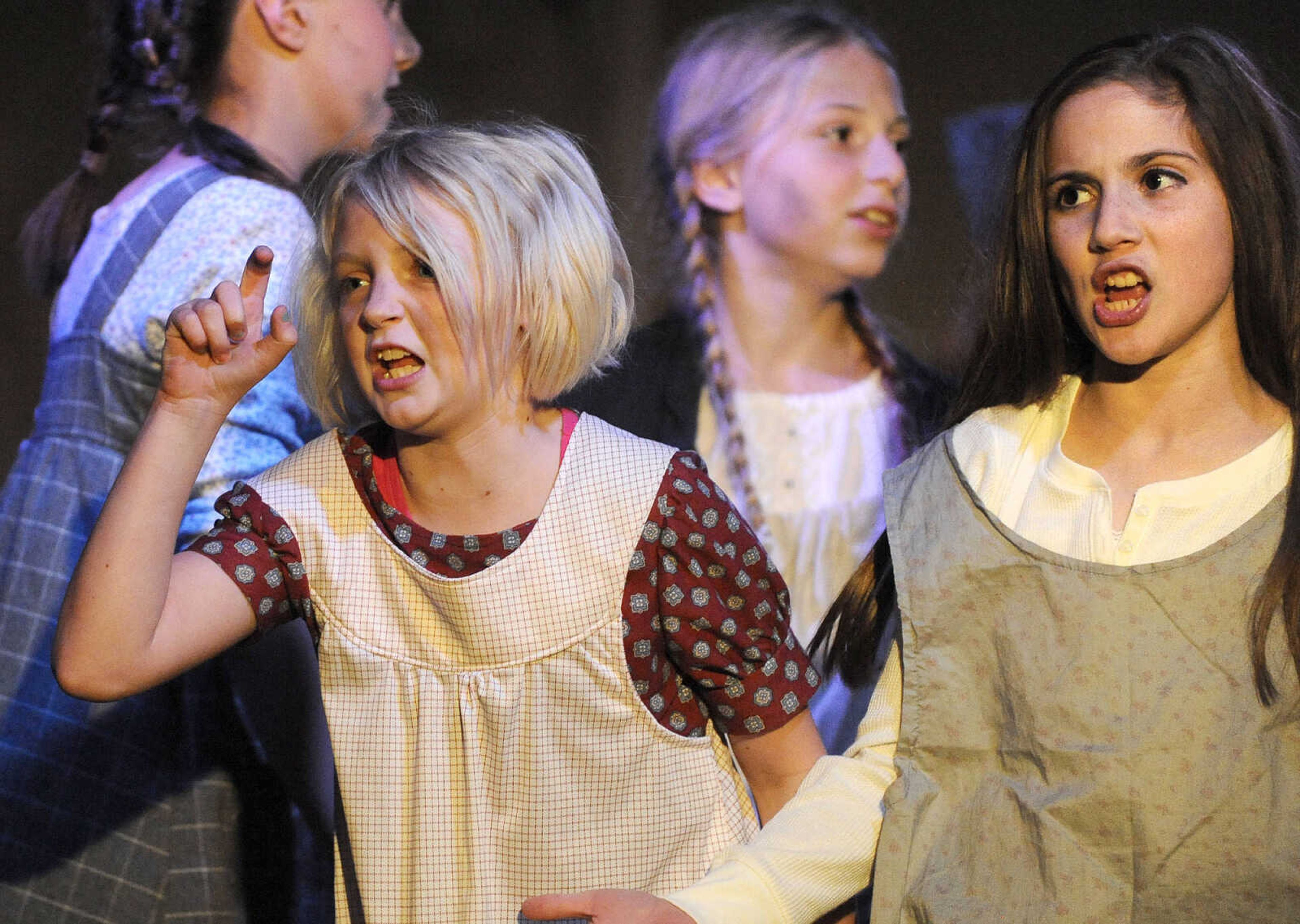 LAURA SIMON ~ lsimon@semissourian.com

Cast members rehearse for "Annie Jr." Wednesday night, May 4, 2016, at The Venue in Cape Girardeau. The condensed version of "Annie" is being produced by On Cue Performing Arts Studio, and the not-for-profit local theater group Acting Out!.