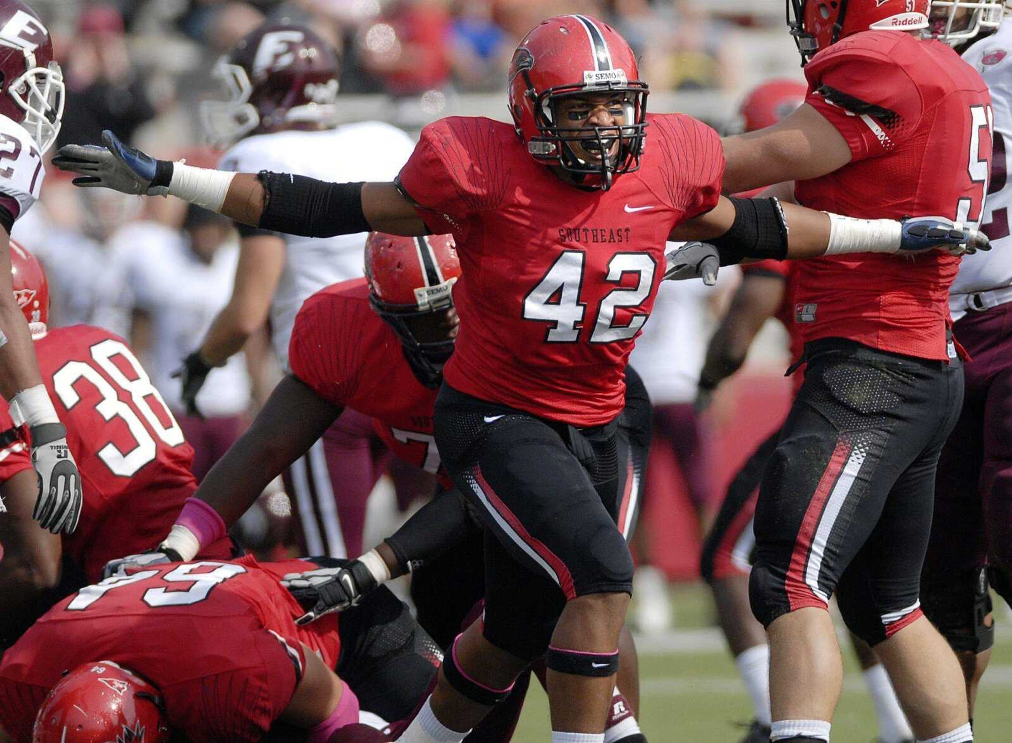 Southeast defender Justin Love reacts after tackling Eastern Kentucky quarterback T.J. Pryor during the second quarter Saturday at Houck Stadium. (Laura Simon)