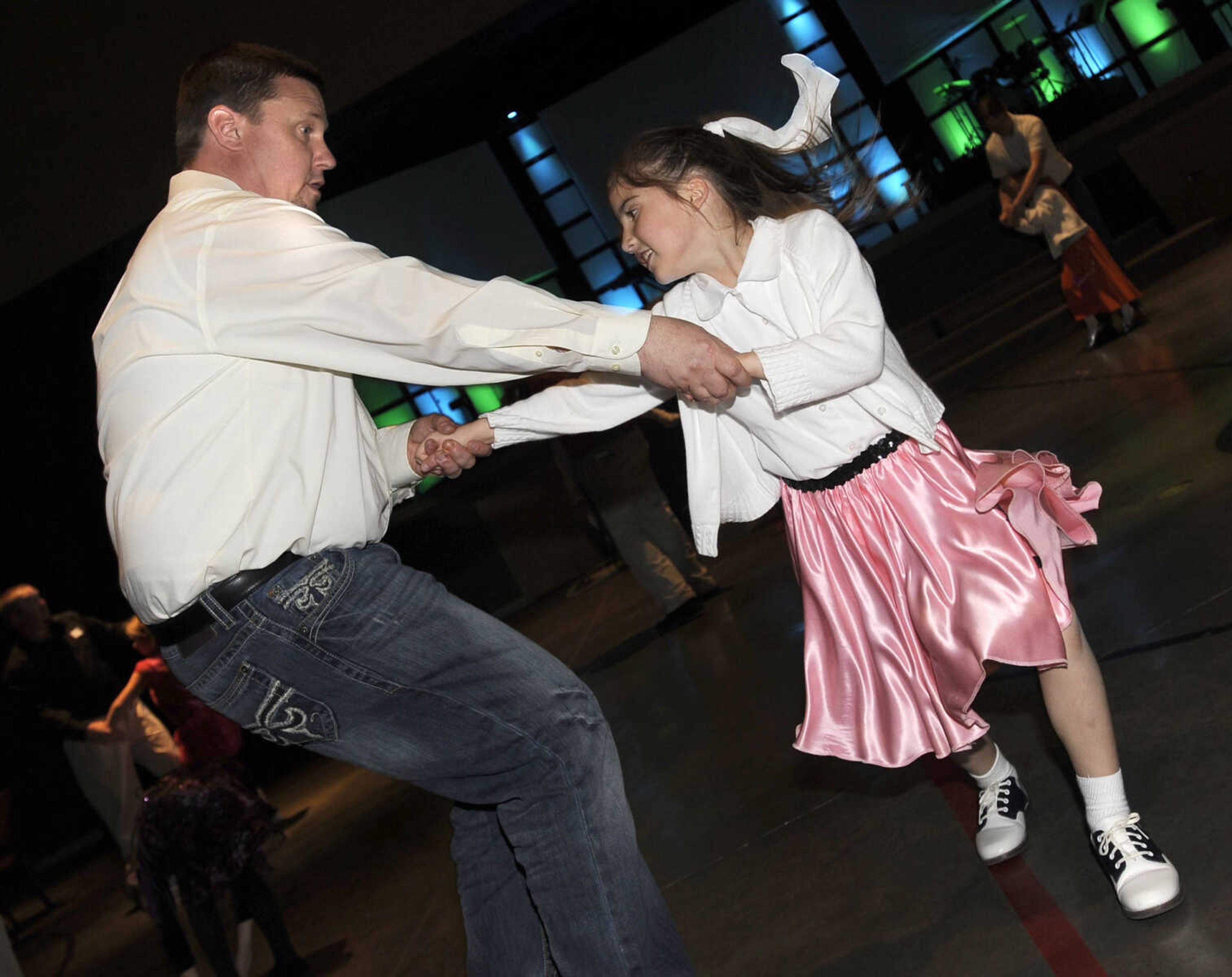 Kevin Alexander and his stepdaughter, Ryanna Steck, enjoy the Me and My Guy Dance.