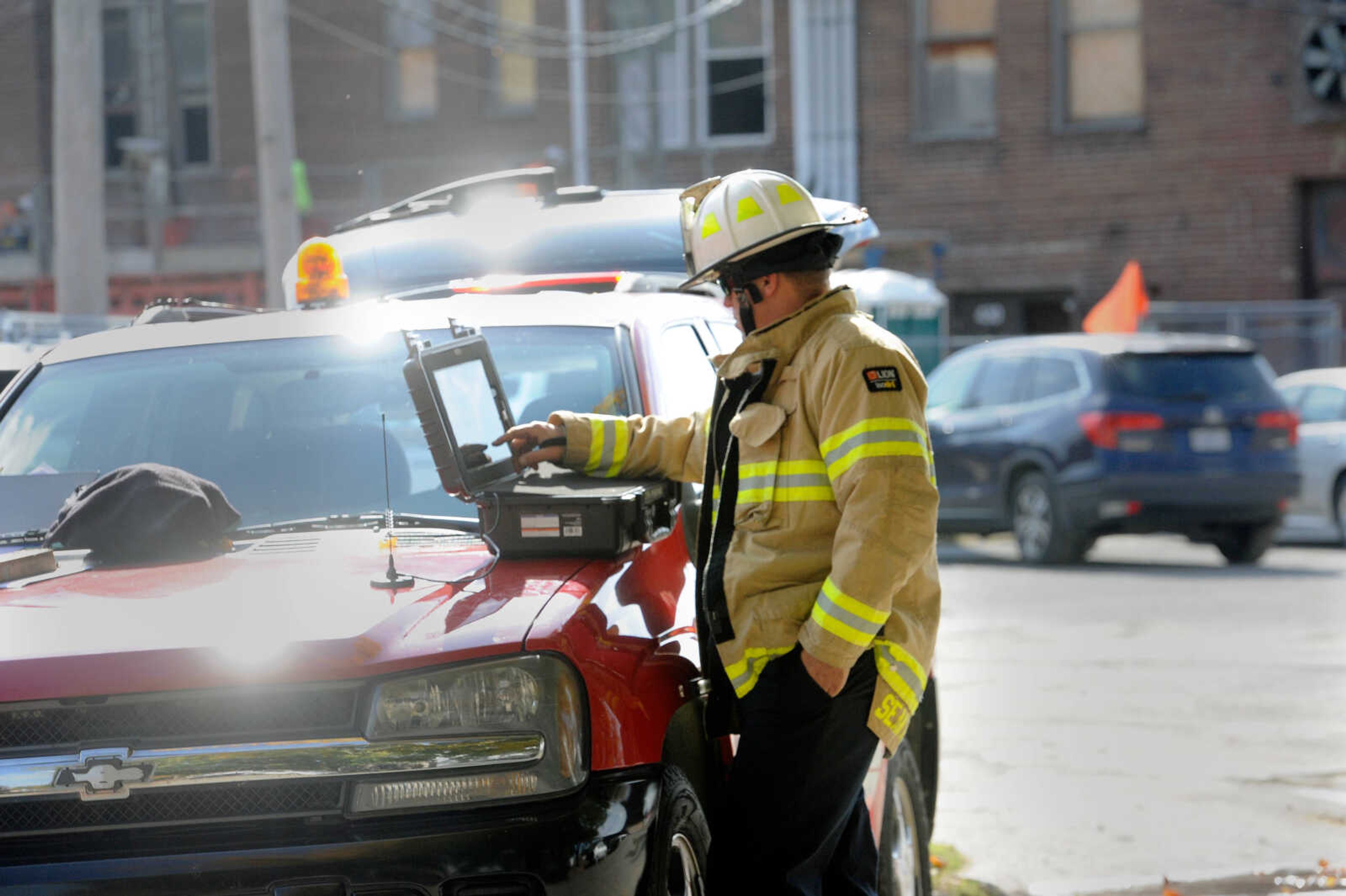 Gordonville Fire Protection District battalion chief Sean Mitchell monitors the live burn exercise at 222 N. Middle St. on Friday, Oct. 23, 2020, held by the Cape Girardeau Fire Department.