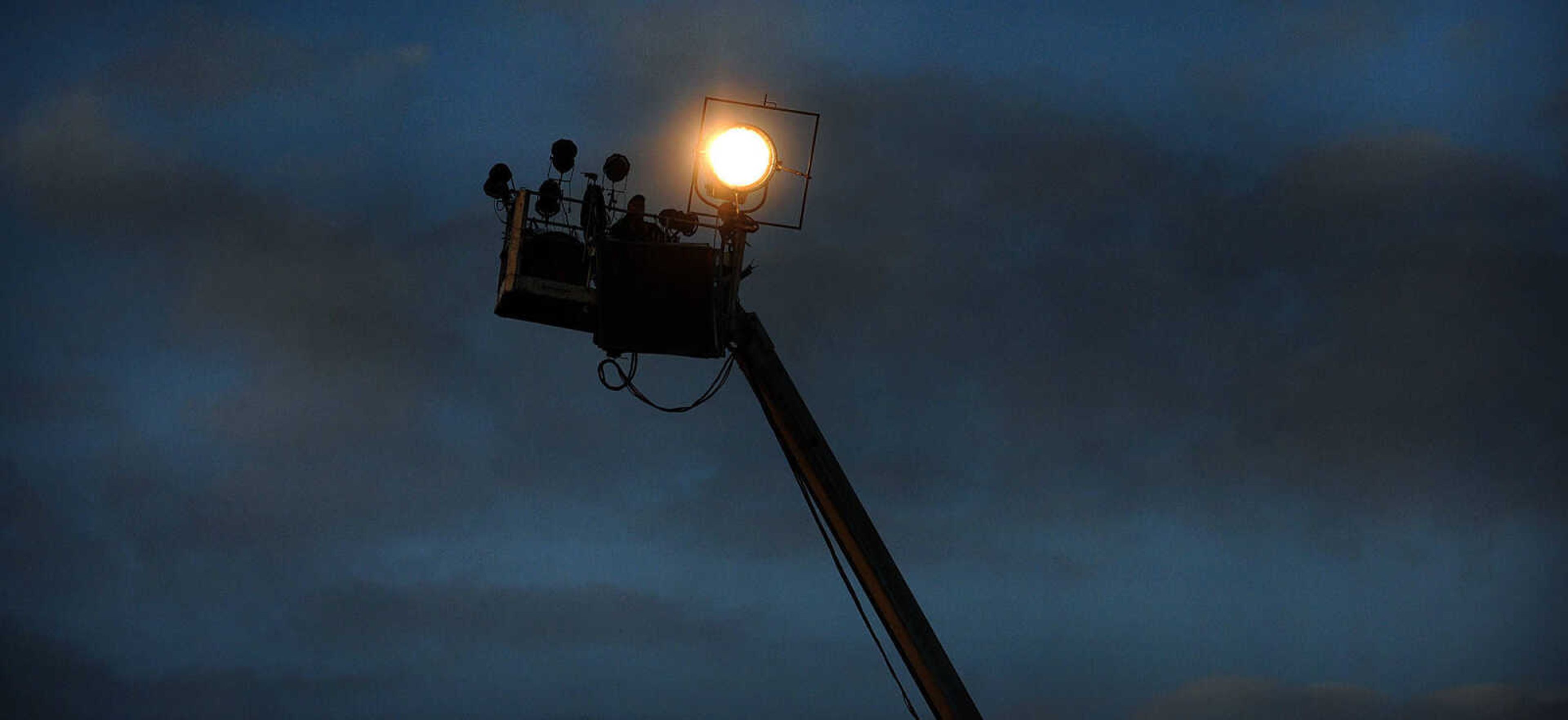 LAURA SIMON ~ lsimon@semissourian.com

Lights for 20th Century Fox's feature film "Gone Girl" are raised up high to illuminate the area around the Common Pleas Courthouse, Thursday, Oct. 3, 2013, in Cape Girardeau.