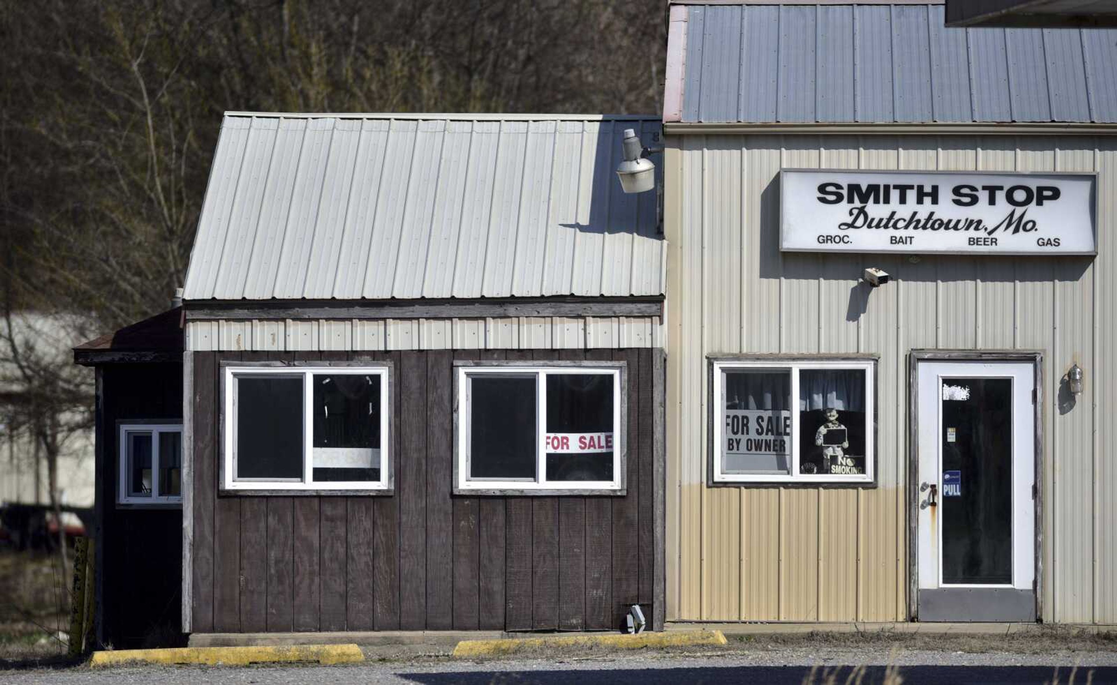 A vacant gas station sits near Highway 74 on Thursday in Dutchtown.