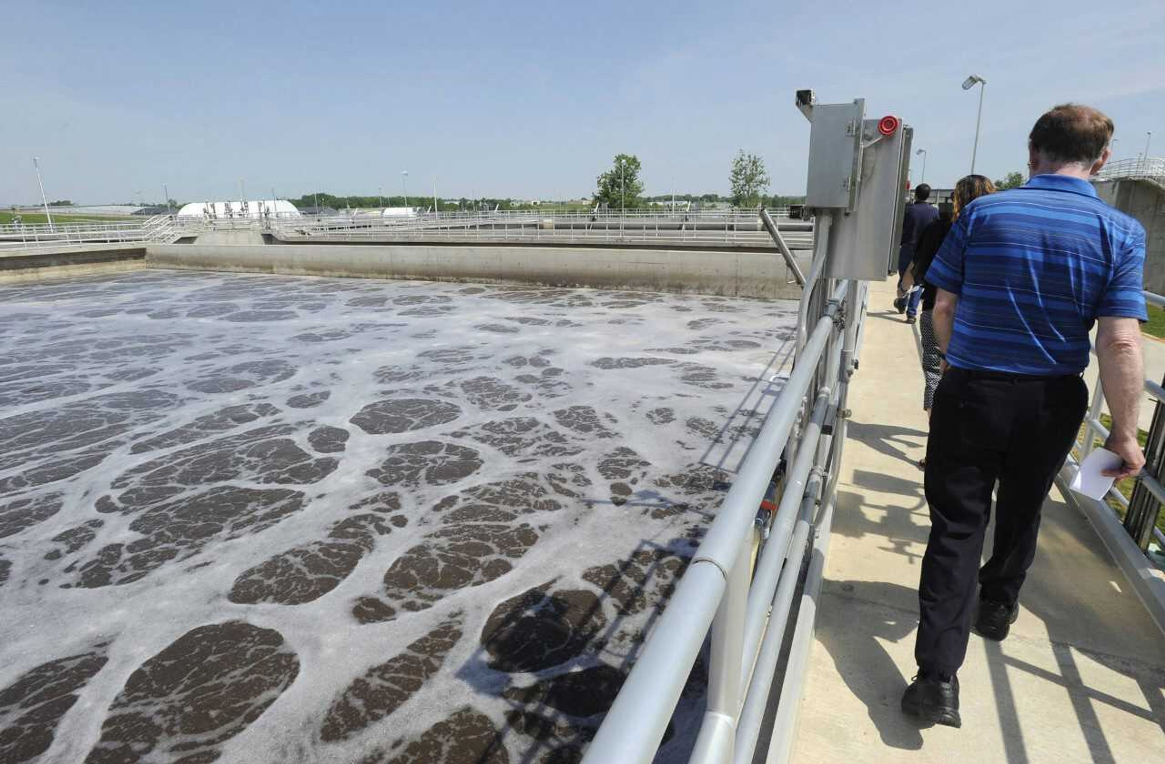 Visitors tour the new wastewater treatment facility May 23, 2016, in Cape Girardeau.