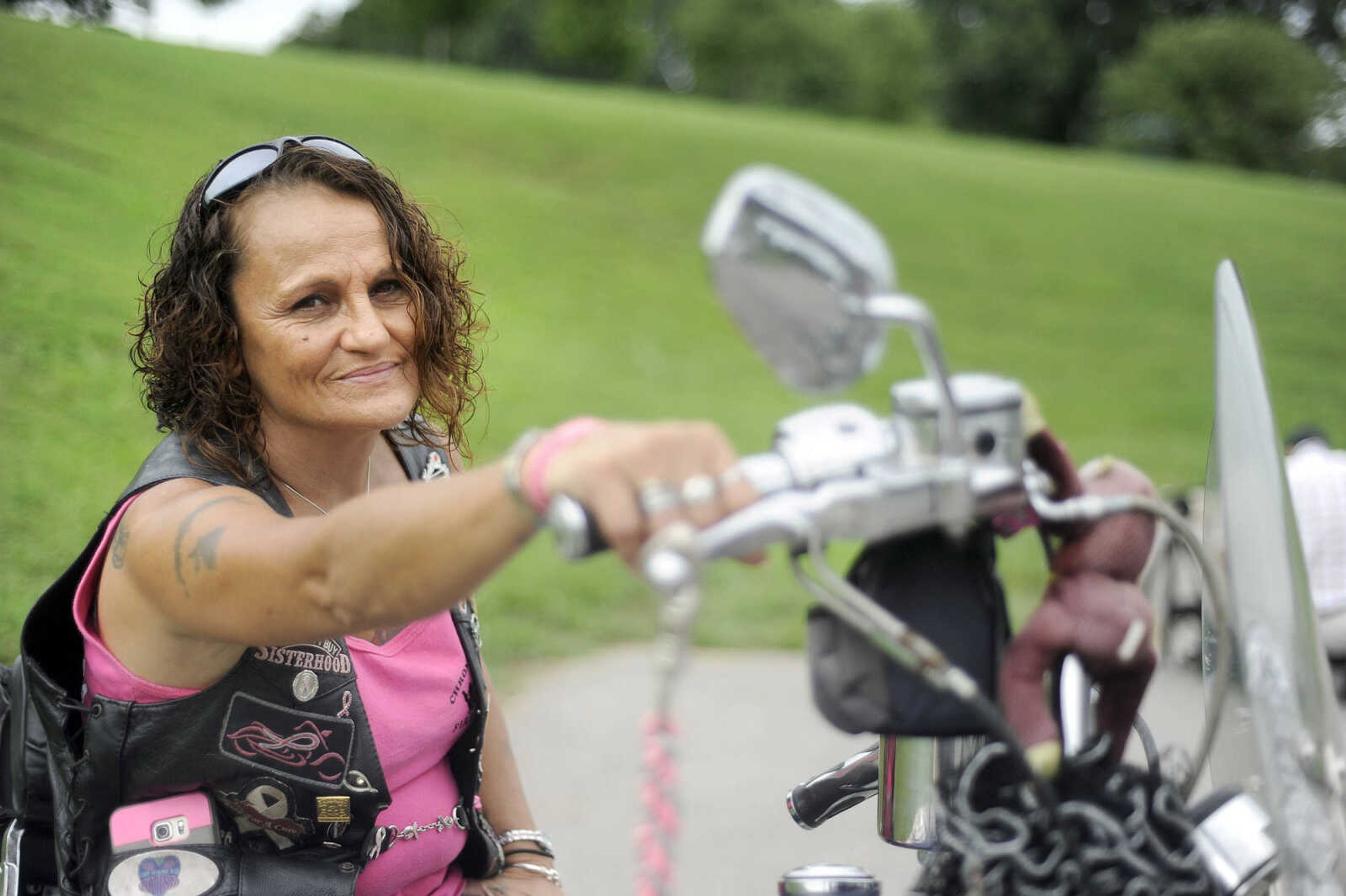 LAURA SIMON ~ lsimon@semissourian.com

Char "Tigger" Miller poses for a photo on her motorcycle in Cape Girardeau on Thursday, Aug. 18, 2016.