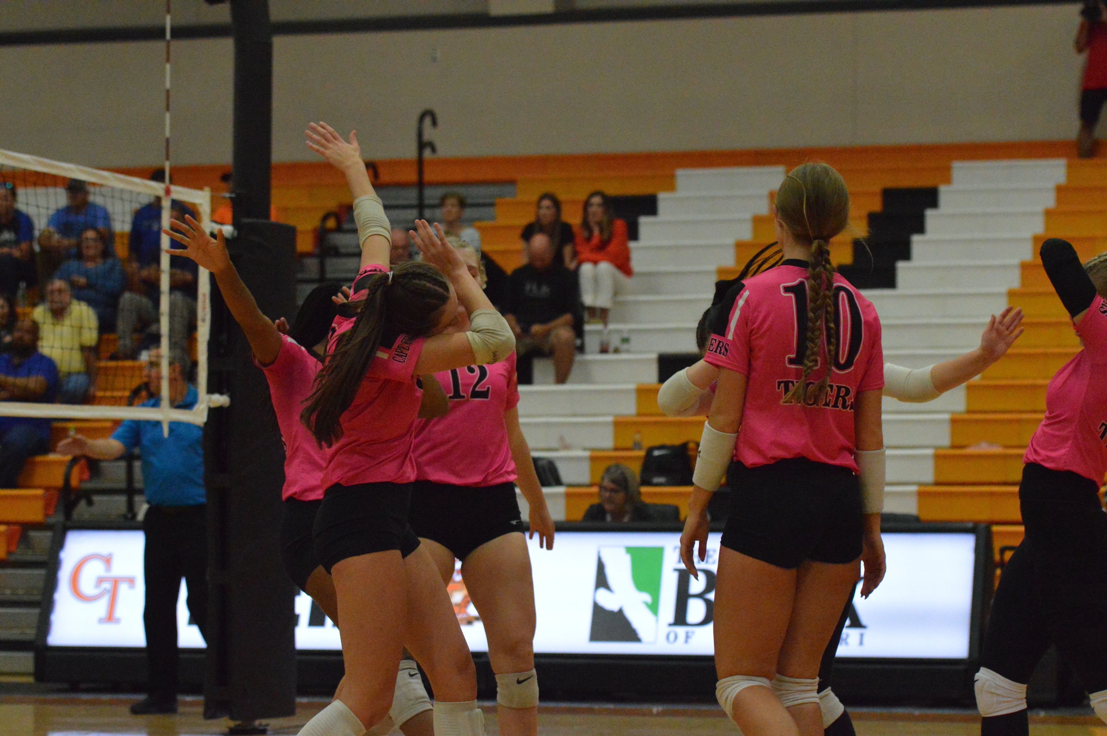 The Cape Central volleyball team dabs and celebrates during a home match against Bernie on Monday, Sept. 16.