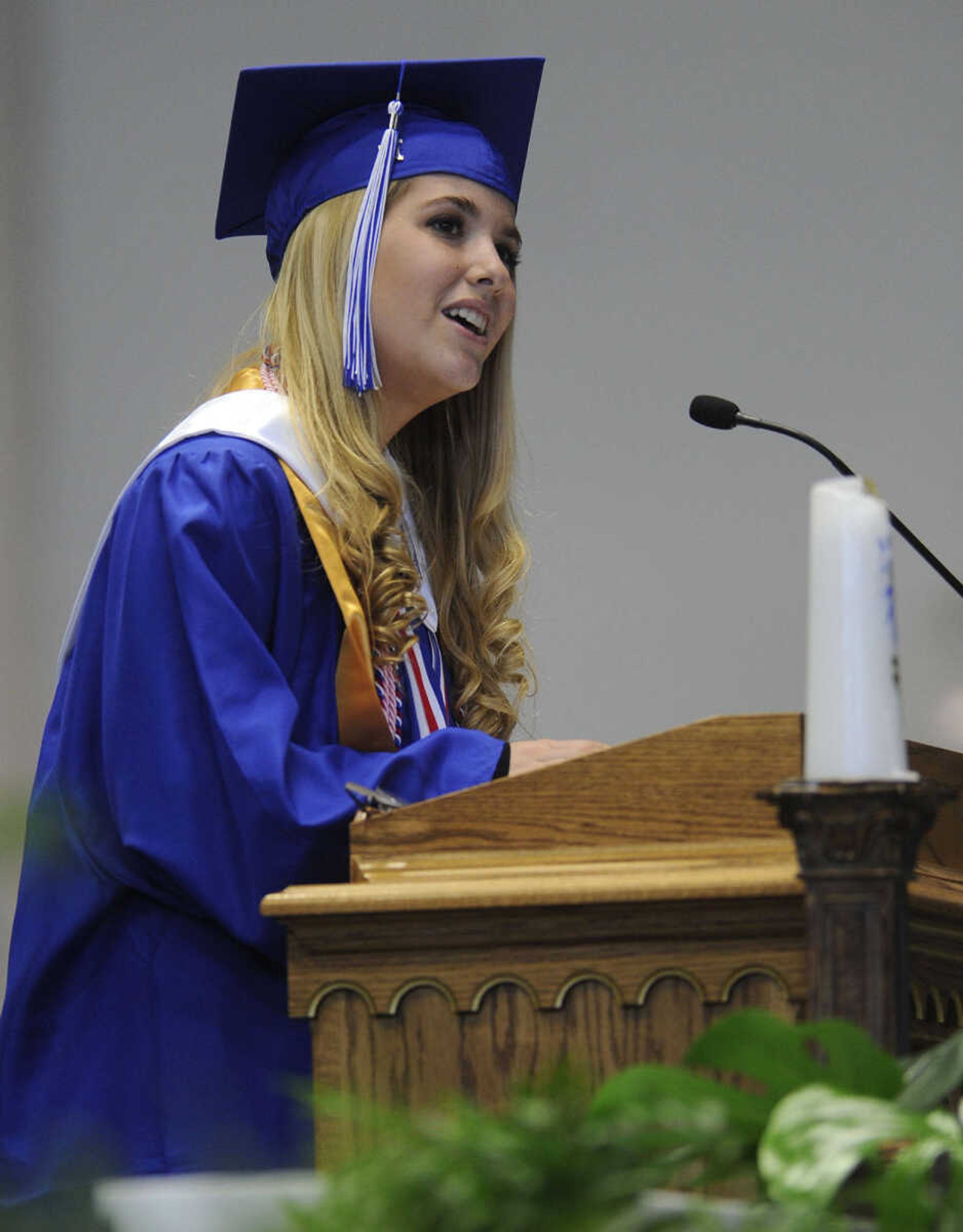 Reagan Kapp presents the salutatory address at the Notre Dame Regional High School commencement Sunday, May 18, 2014.