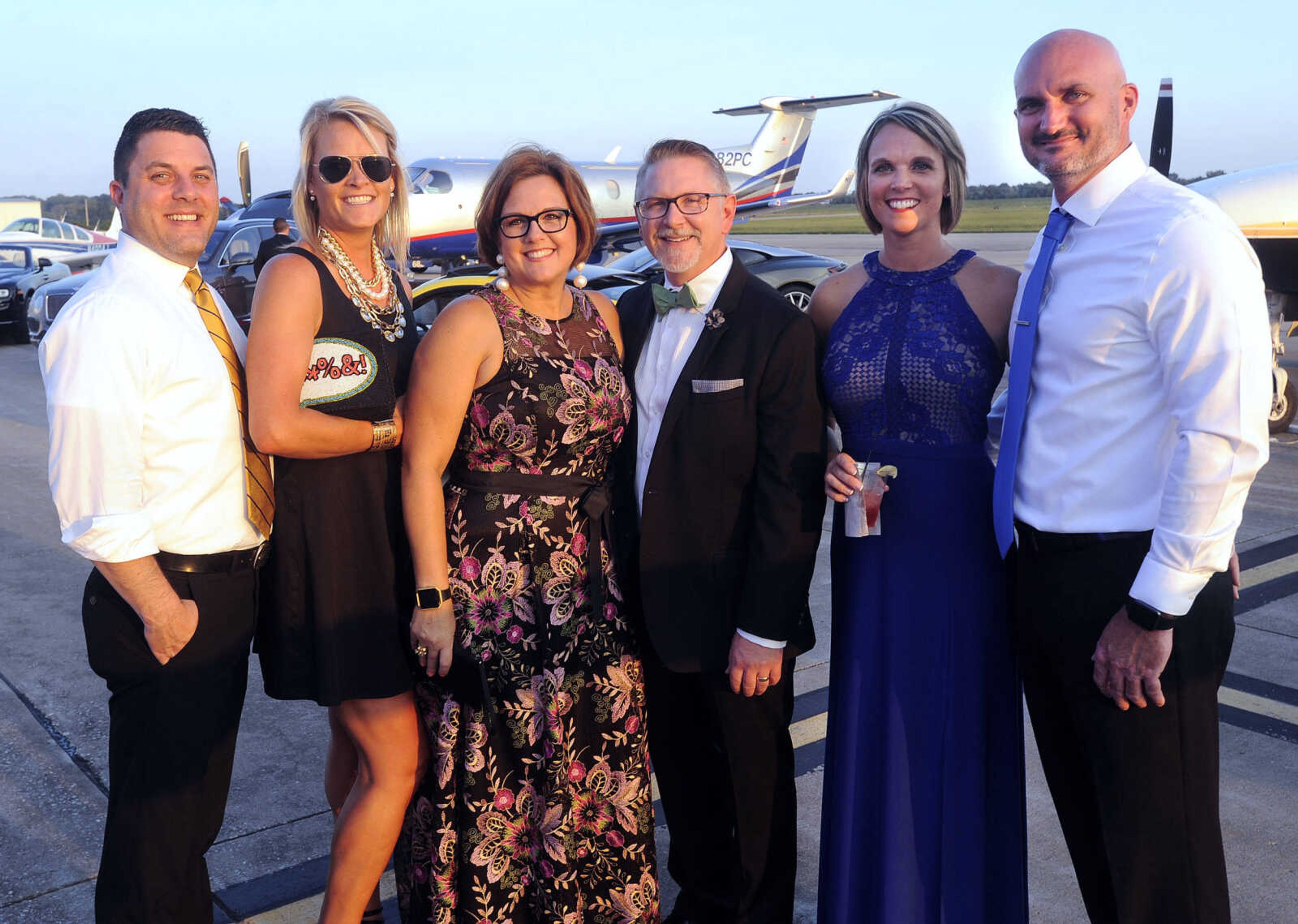 FRED LYNCH ~ flynch@semissourian.com
Tres Reed, left, Whitney Reed, Allison Davis, Ryan Davis, Angie Bauer and Mike Holloway pose for a photo Saturday, Sept. 23, 2017 at the American Cancer Society Gala at the Cape Girardeau Regional Airport.