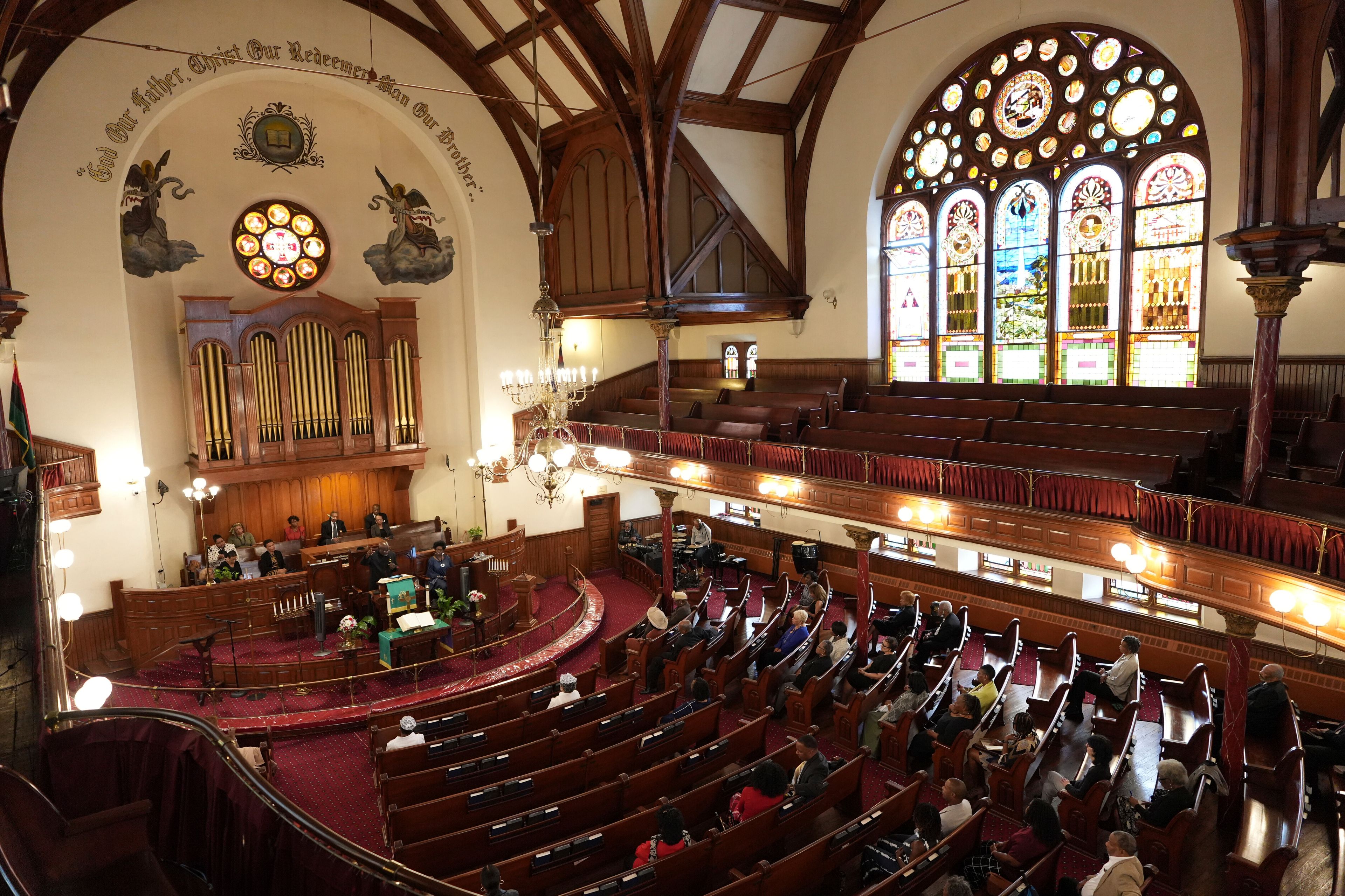 Congregants pray at Mother Bethel AME Church in Philadelphia during a service on Sunday, Sept. 29, 2024. (AP Photo/Luis Andres Henao)