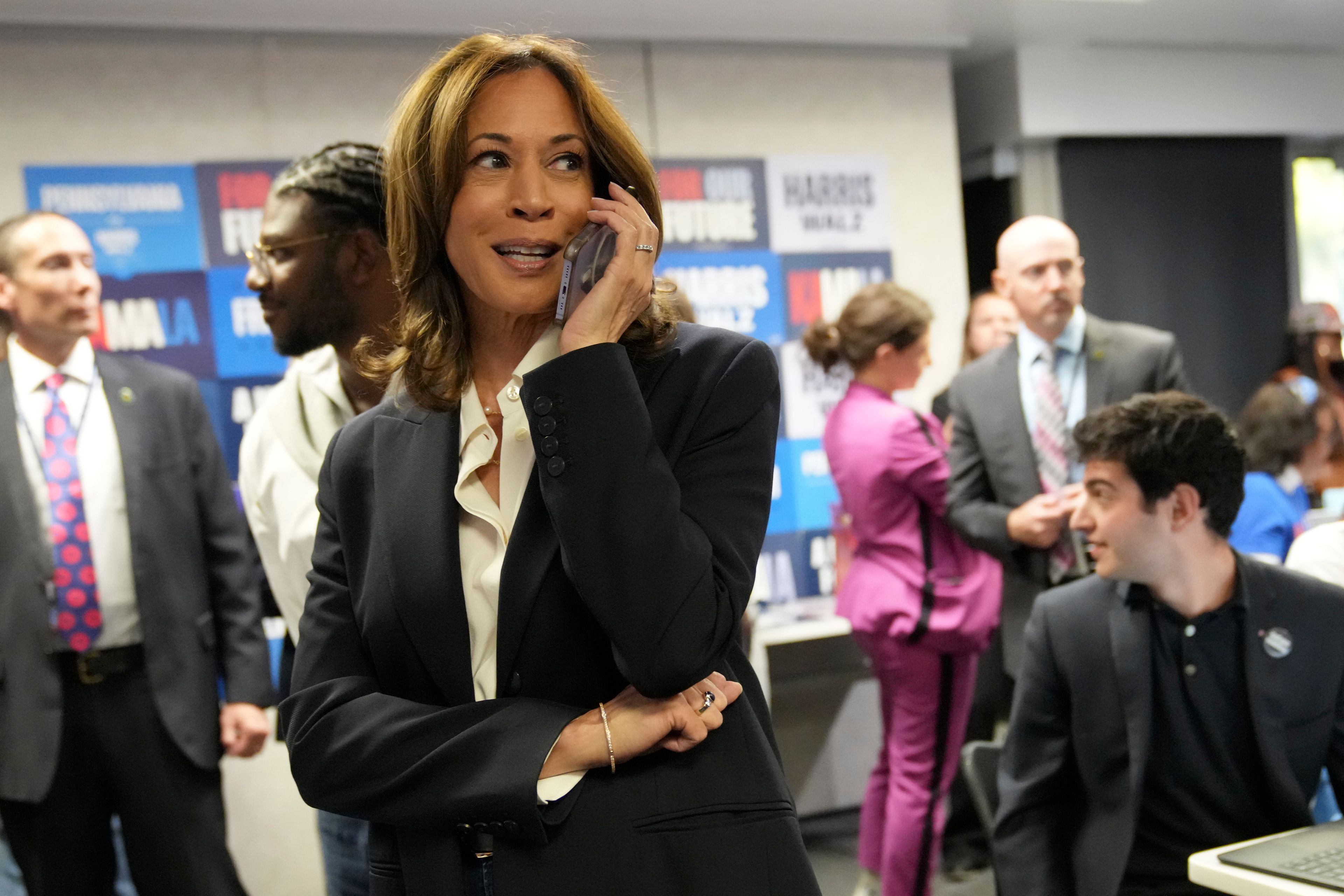 Democratic presidential nominee Vice President Kamala Harris phone banks with volunteers at the DNC headquarters on Election Day, Tuesday, Nov. 5, 2024, in Washington. (AP Photo/Jacquelyn Martin)