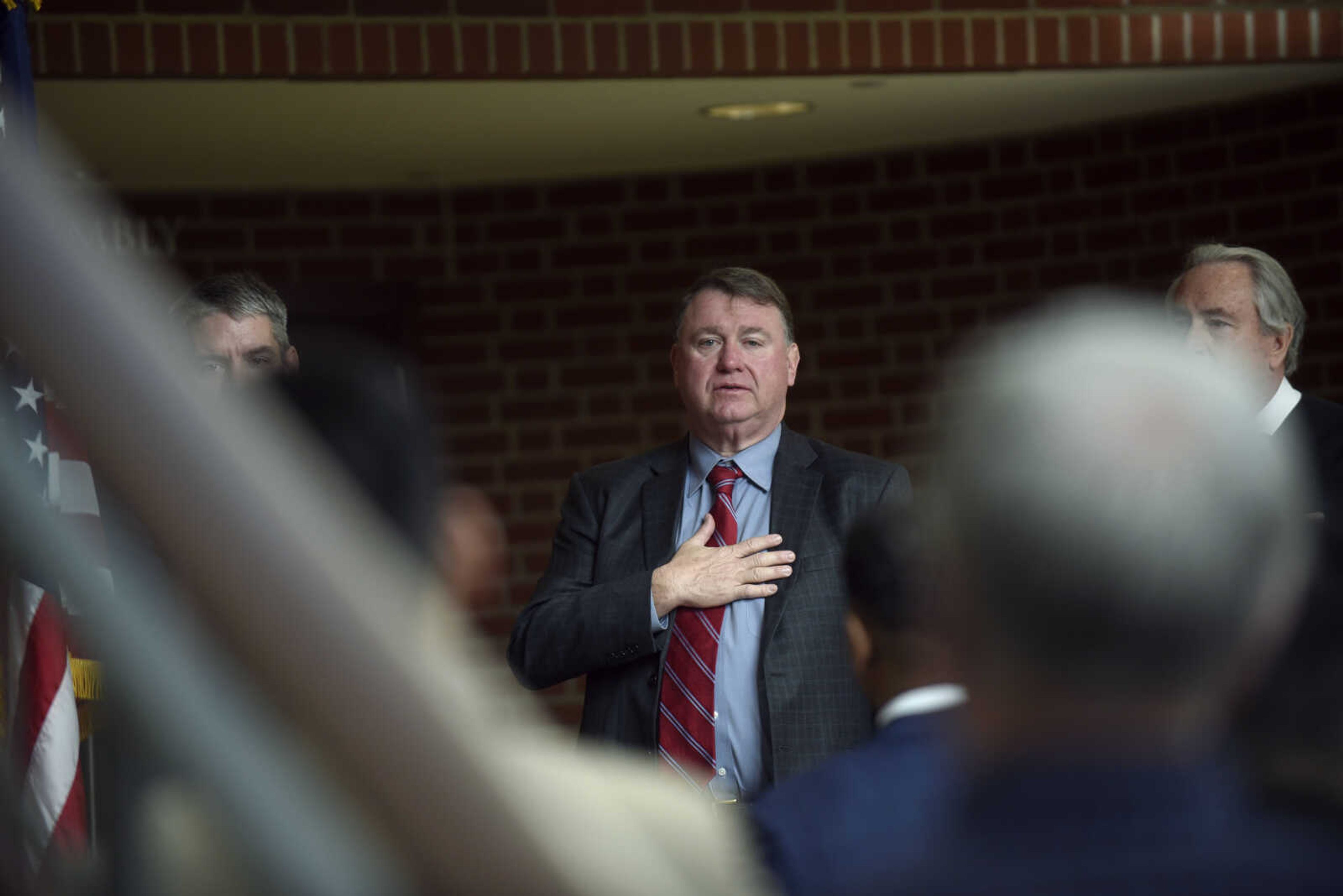 Chief Justice of the Supreme Court of Missouri Hon. Zel M. Fischer says the Pledge of Allegiance during the United States District Court Eastern District of Missouri Southeastern Division's naturalization ceremony on Friday, April 6, 2018, at the Rush Hudson Limbaugh, Jr., United States Courthouse in Cape Girardeau.