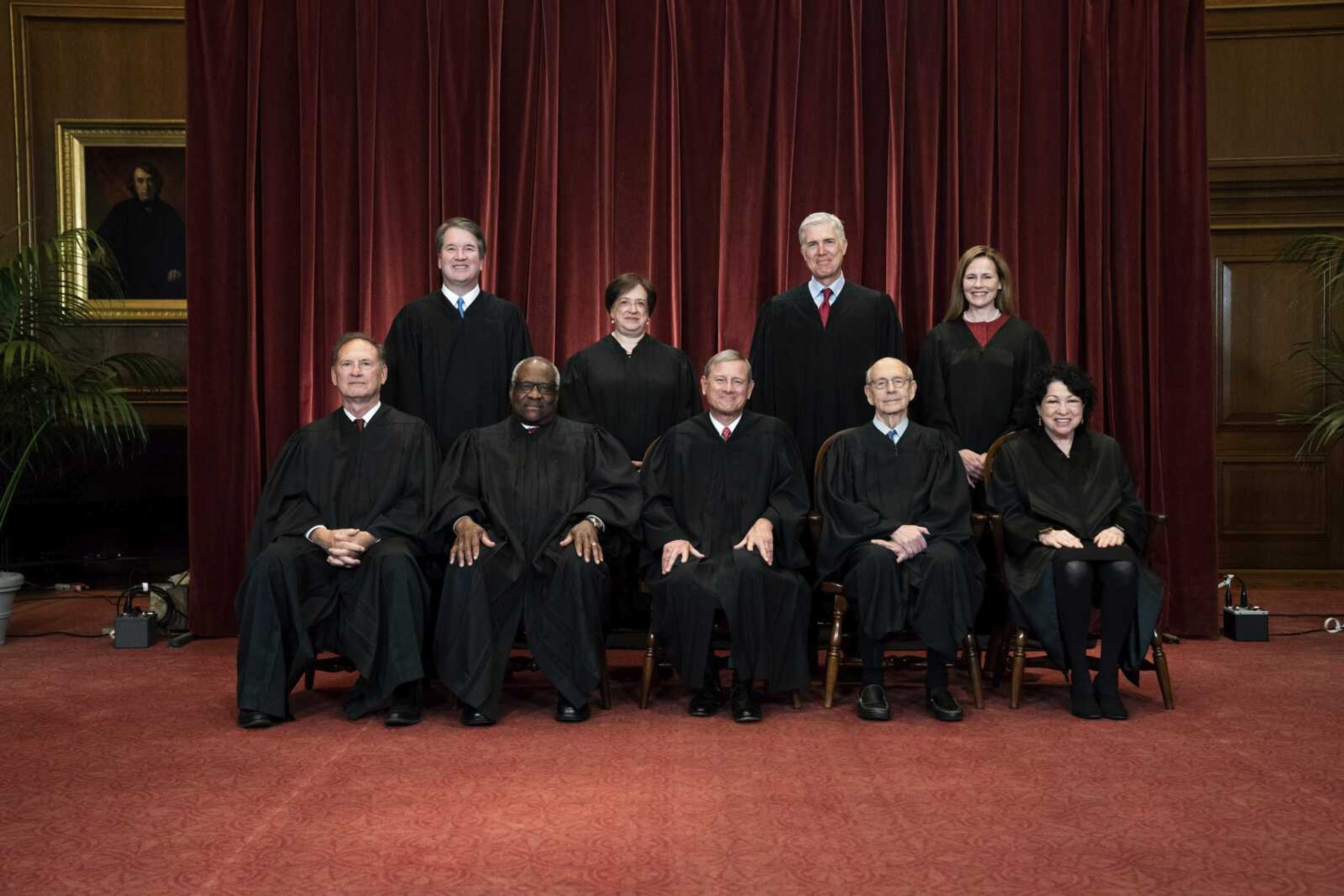 Members of the Supreme Court pose for a group photo at the Supreme Court on April 23 in Washington. Seated from left are Associate Justice Samuel Alito, Associate Justice Clarence Thomas, Chief Justice John Roberts, Associate Justice Stephen Breyer and Associate Justice Sonia Sotomayor, Standing from left are Associate Justice Brett Kavanaugh, Associate Justice Elena Kagan, Associate Justice Neil Gorsuch and Associate Justice Amy Coney Barrett.