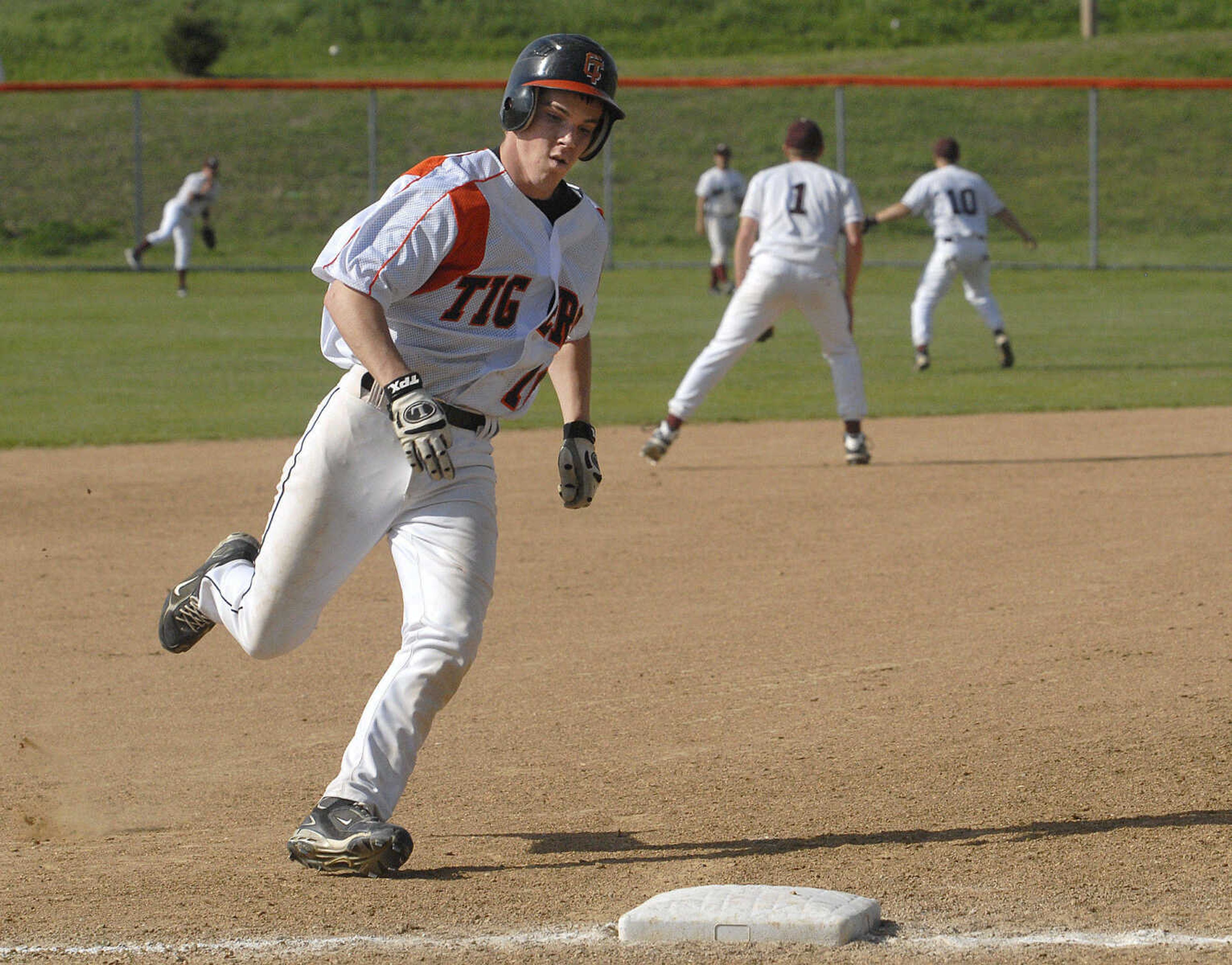 FRED LYNCH ~ flynch@semissourian.com
Central's Erik Allen rounds third base on his way to scoring on a double by Jamie Pickel in the second inning against Poplar Bluff Friday at Central High School.