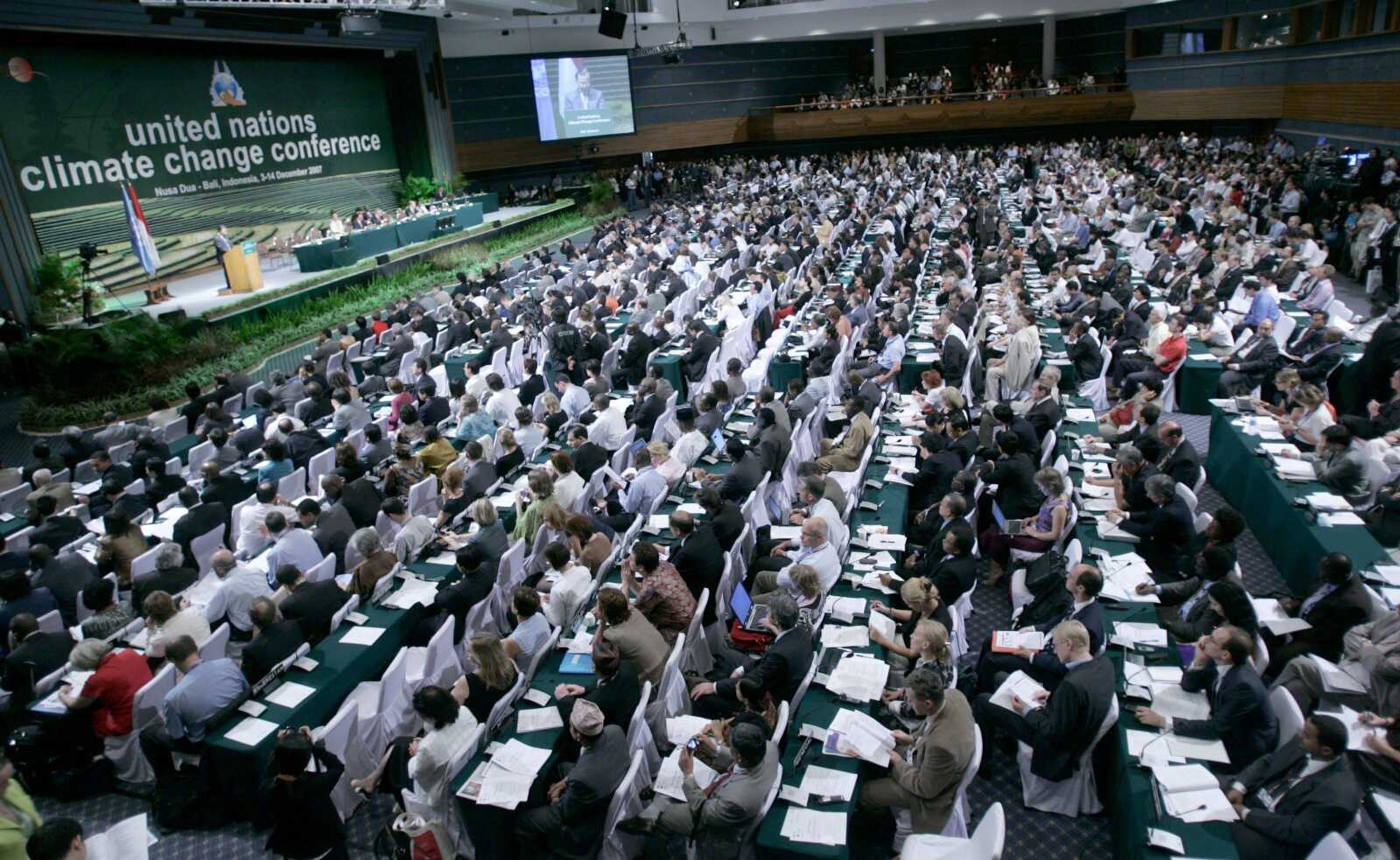 Delegates attend the opening ceremony of U.N. Climate Conference on Monday in Nusa Dua, Bali island, Indonesia. <br>Dita Alangkara<br>Associated Press