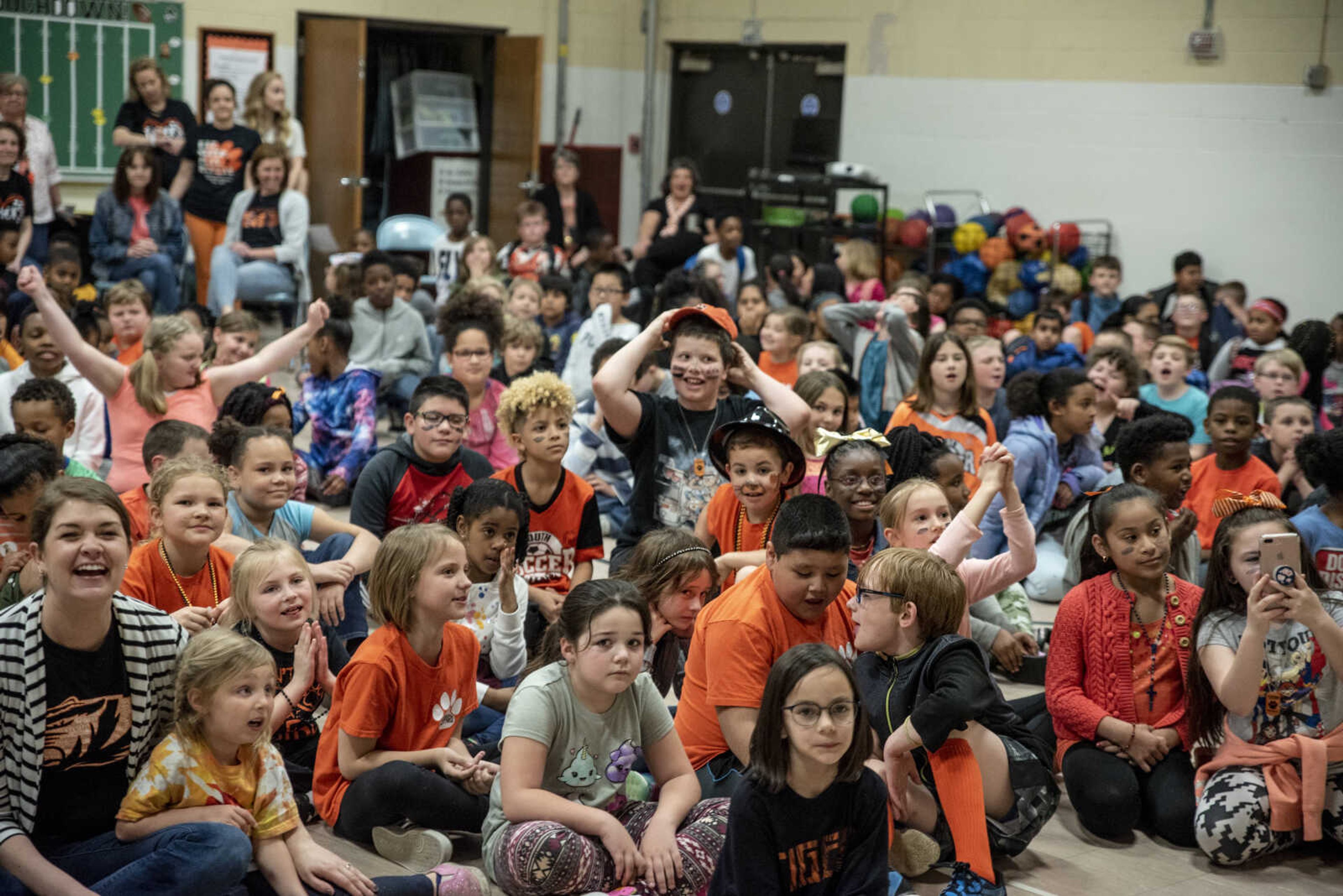 Students react to watching classmates pie faculty members in the face at Clippard Elementary School Friday, April 5, 2019, in Cape Girardeau. Students earned votes for which teacher(s) would get pied in the face when they brought in donations to raise money for their end-of-the-year play day that is free to students. Through students and other donations, the school raised $550 towards their play day activities.