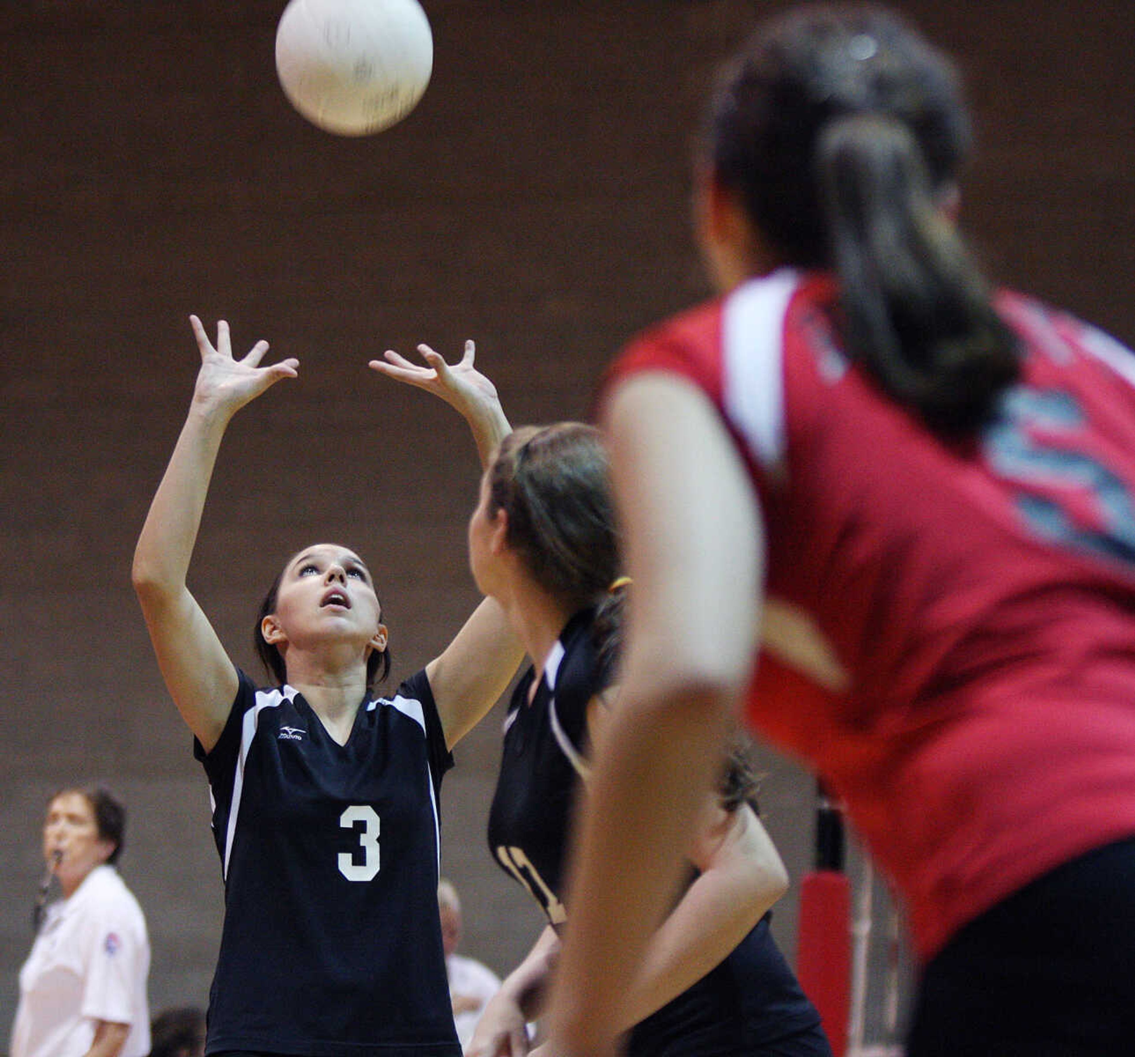 Bell City's Ashley Green sets the ball up for teammates.