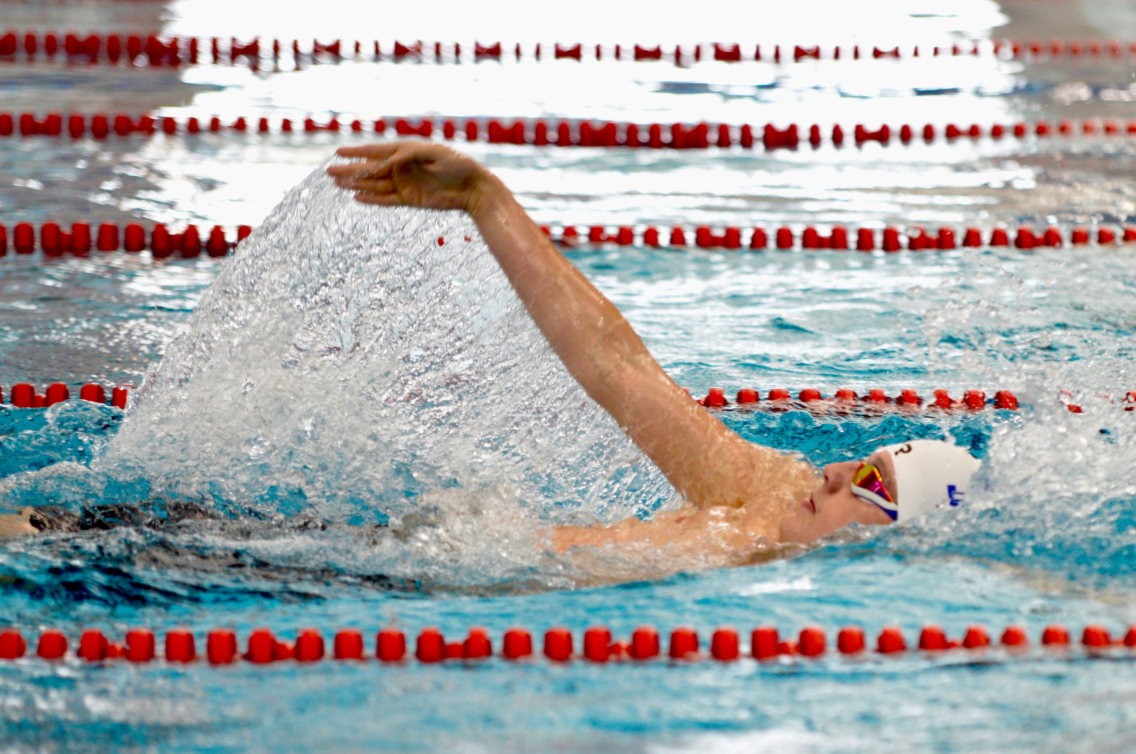 Notre Dame’s Kaiden Cracraft swims against Cape Central on Tuesday, Oct. 29, at the Cape Aquatic Center.