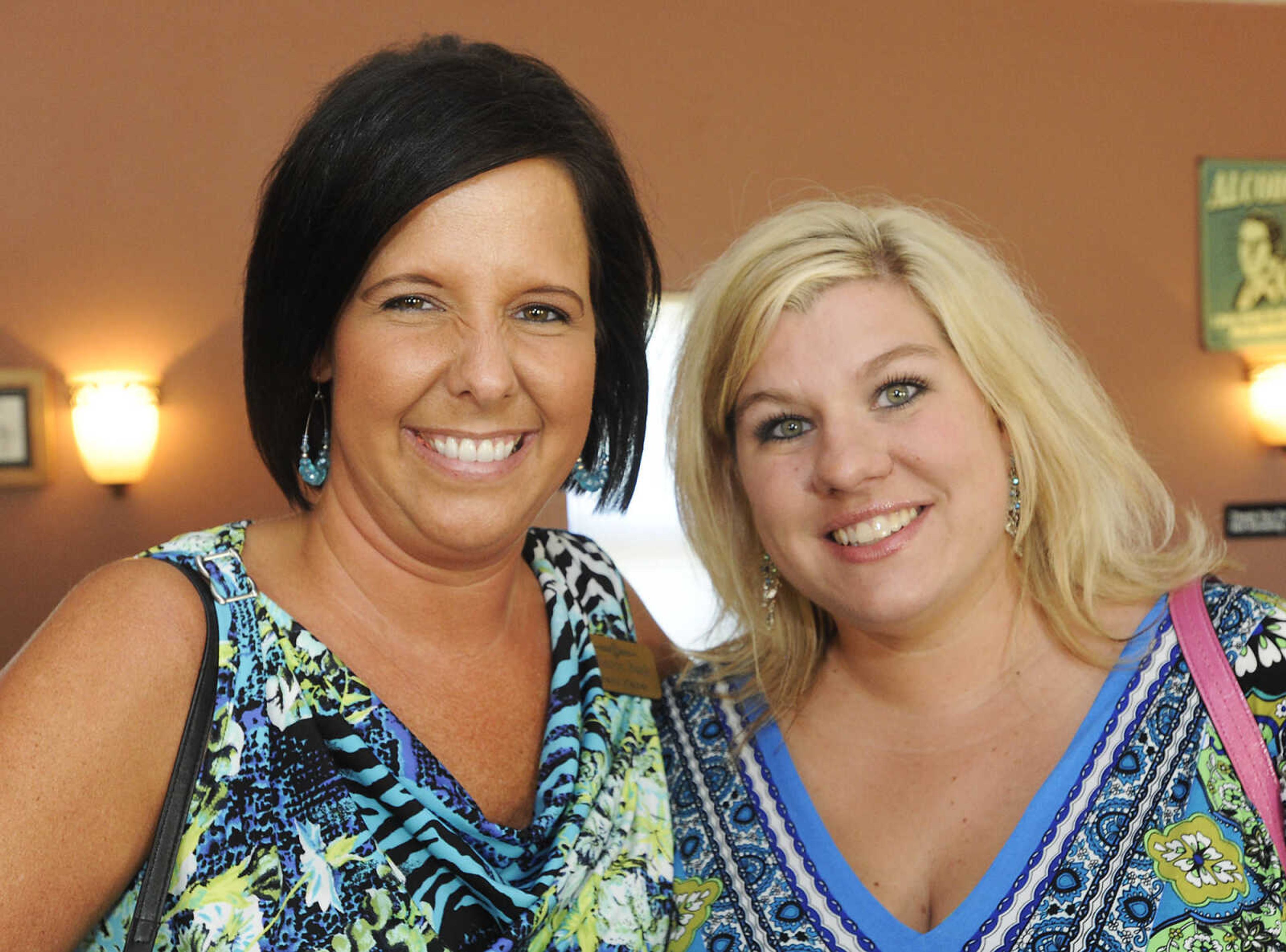 Shelly Kaiser of Alliance Bank, left, and Heather Short of the United Way of SEMO at the Cape Girardeau Area Chamber of Commerce Business After Hours Tuesday, July 16, at the Hunter Valley Winery, 762 State Highway V, in Cape Girardeau.