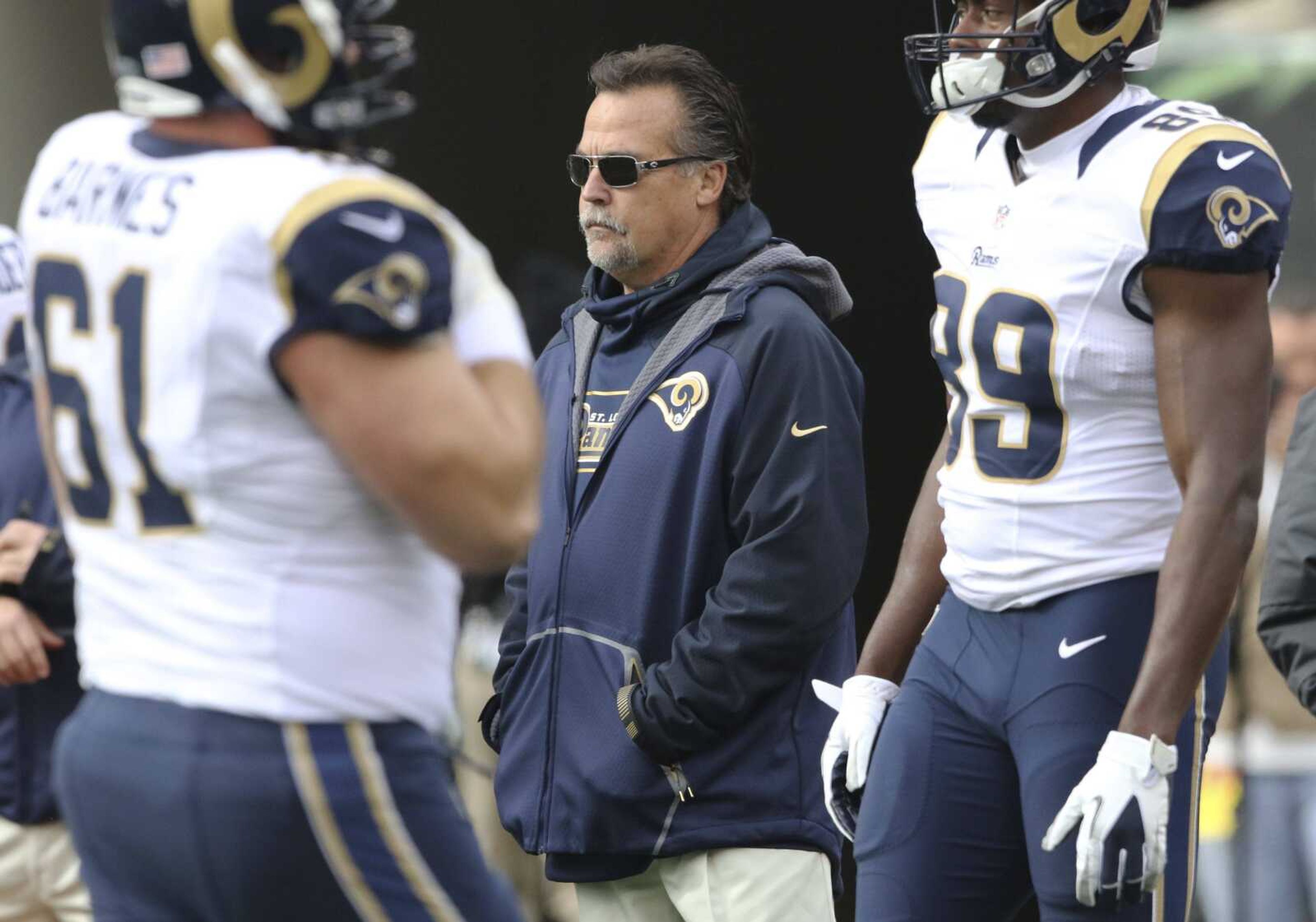 Rams coach Jeff Fisher stands on the field before a recent game against the Bengals in Cincinnati. The Rams play the San Francisco 49ers today in what could be their final game affiliated with the city of St. Louis. (Gary Landers ~ Associated Press)