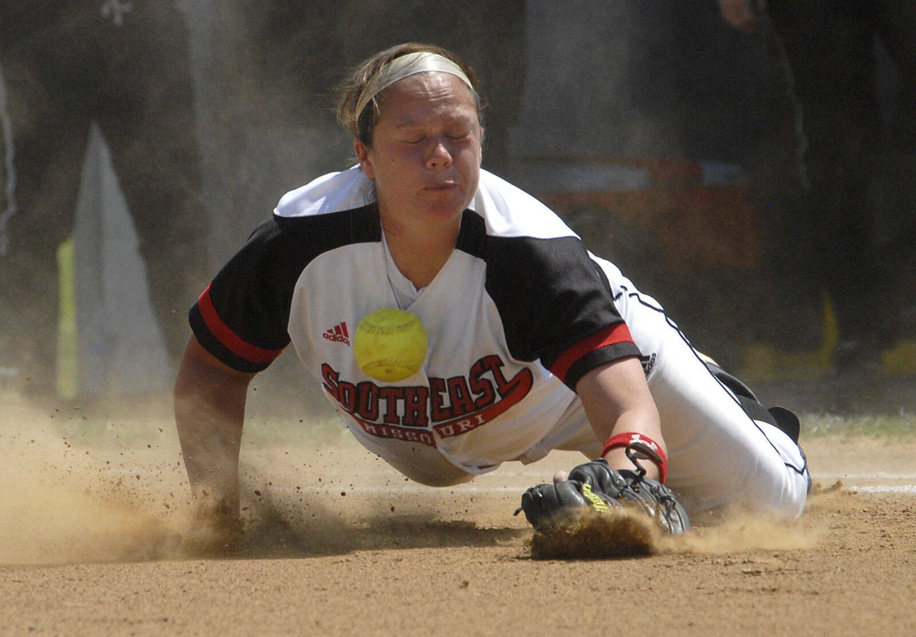 Southeast Missouri State first baseman Lauren Bradley comes up short with an Eastern Kentucky infield hit.