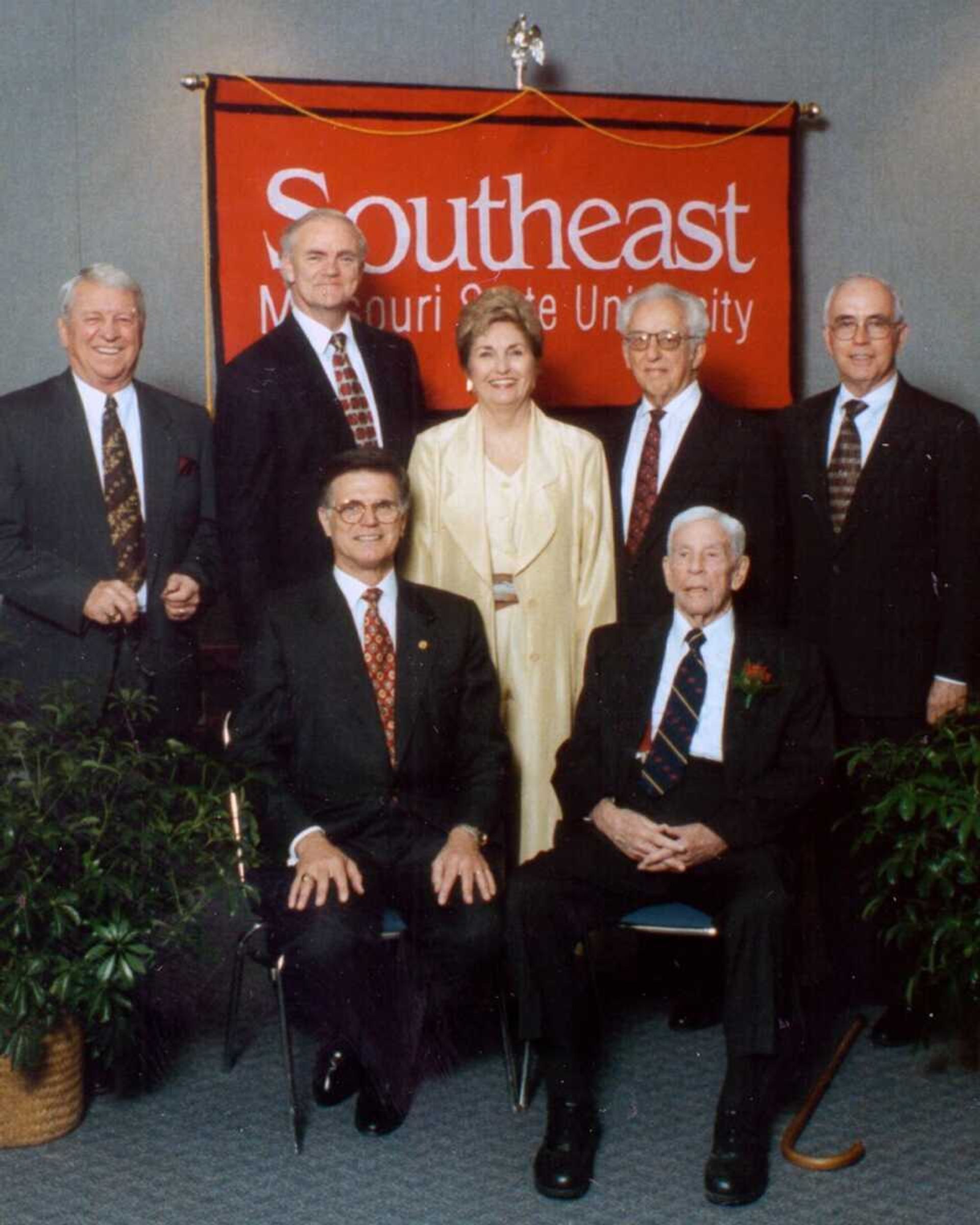 Former Southeast Missouri State University presidents, standing, from left, Bill Atchley (1996-1996), Bill Stacy (1980-1989), Kala Stroup (1990-1995), Robert Leestamper (1975-1979) and Robert Foster (1989). Seated, from left, Dale Nitschke (1996-1999) and Mark Scully (1956-1975).