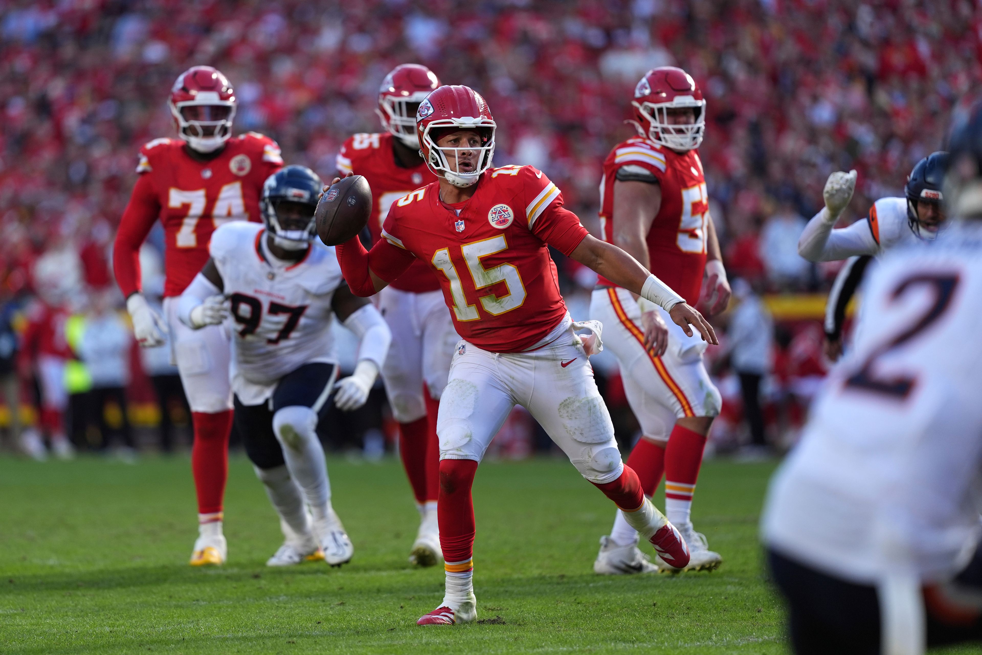 Kansas City Chiefs quarterback Patrick Mahomes (15) throws during the second half of an NFL football game against the Denver Broncos Sunday, Nov. 10, 2024, in Kansas City, Mo. (AP Photo/Charlie Riedel)