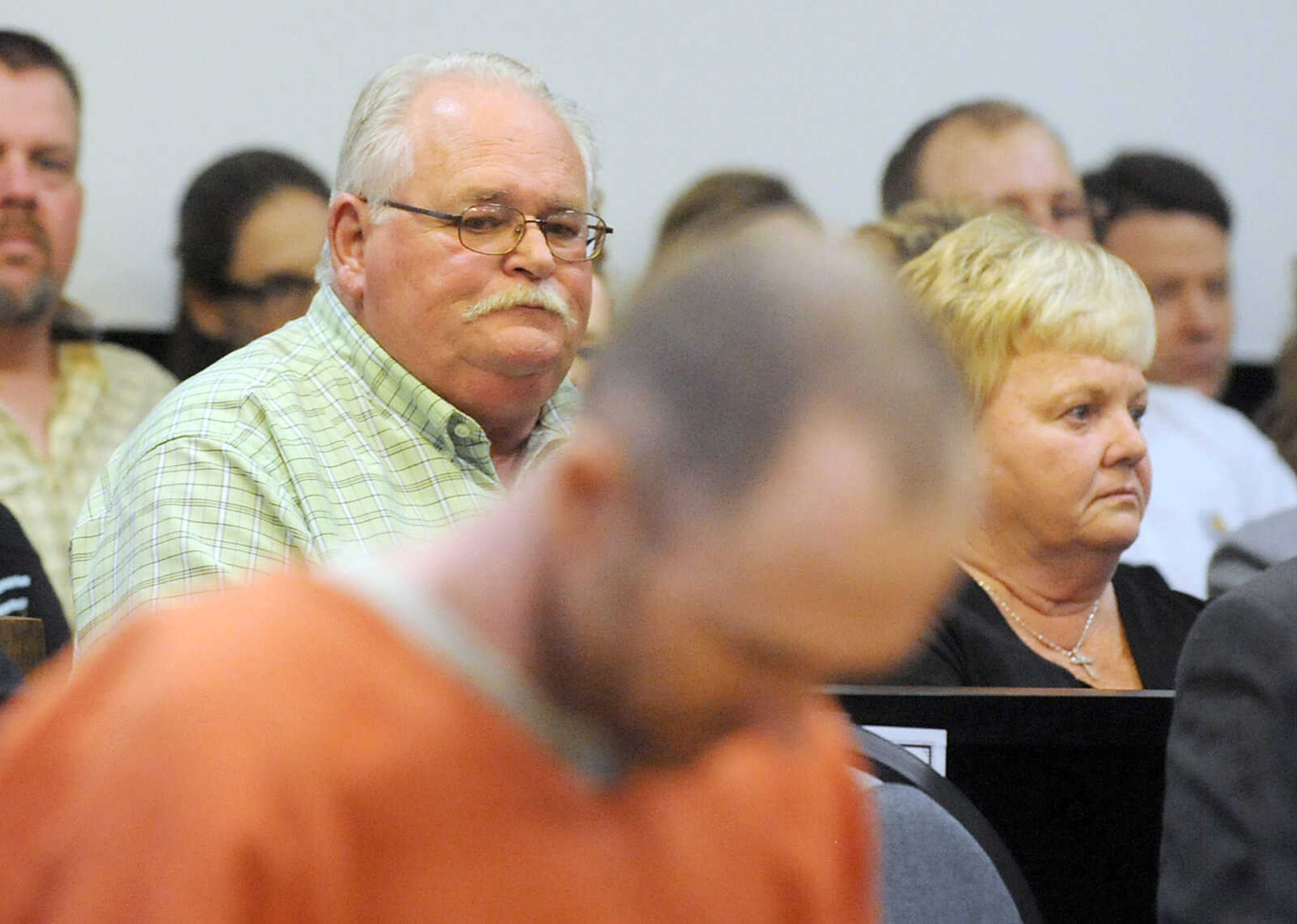 LAURA SIMON ~ lsimon@semissourian.com
Stan and Ruby Rawson sit behind Clay Waller Thursday, June 6, 2013, inside the Cape Girardeau County Courthouse. Waller pleaded guilty to second-degree murder for the death of the Rawson's daughter, Jacque Waller. Jacque Waller went missing June 1, 2011. Her body was found last Wednesday in Southern Illinois.