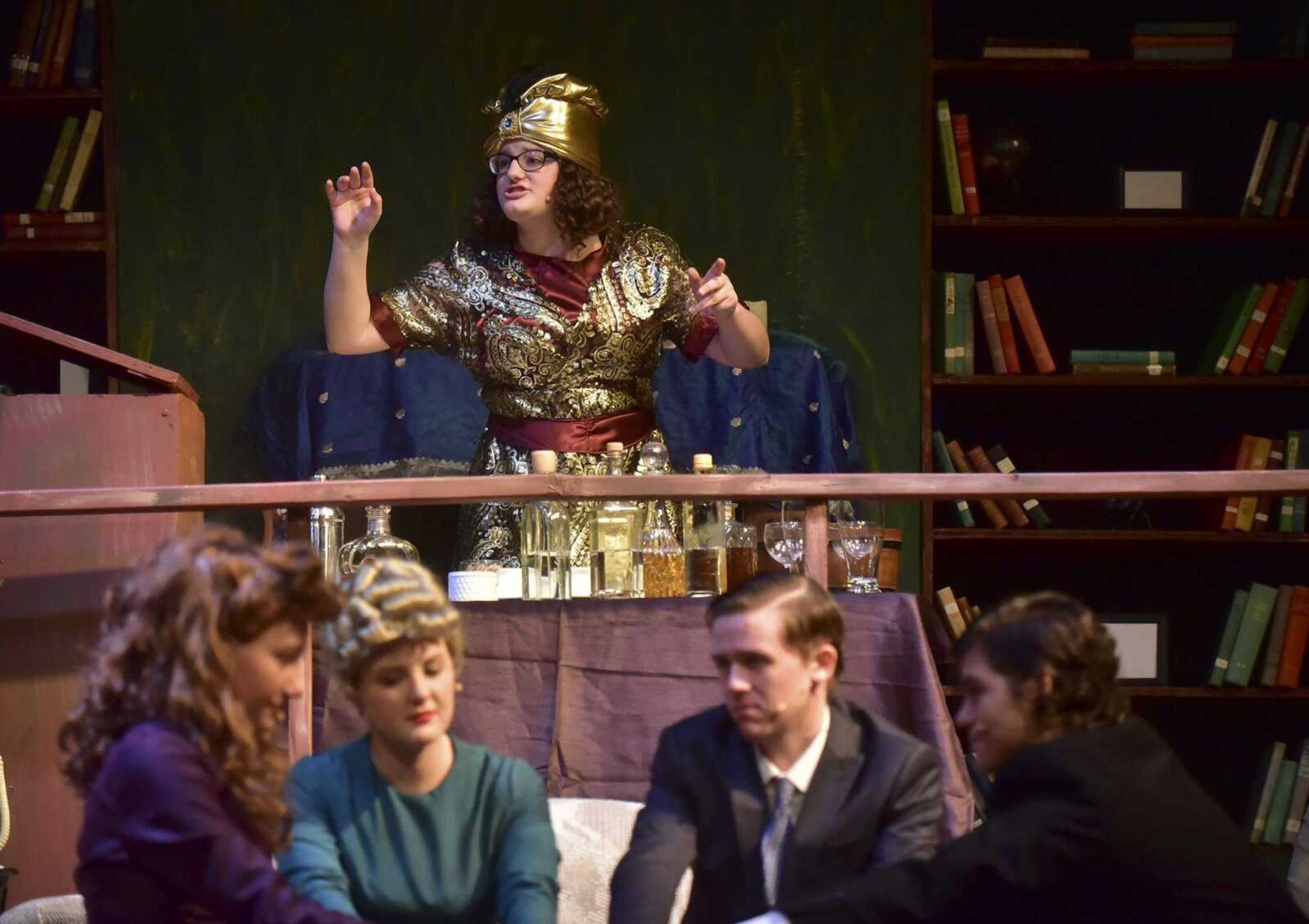 Grace Goeckler as Madame Arcati performs a sÃˆance while acting out a scene during a dress rehearsal for the play Blithe Spirit at the Richard D. Kinder Performance Hall at Cape Central High School in Cape Girardeau.