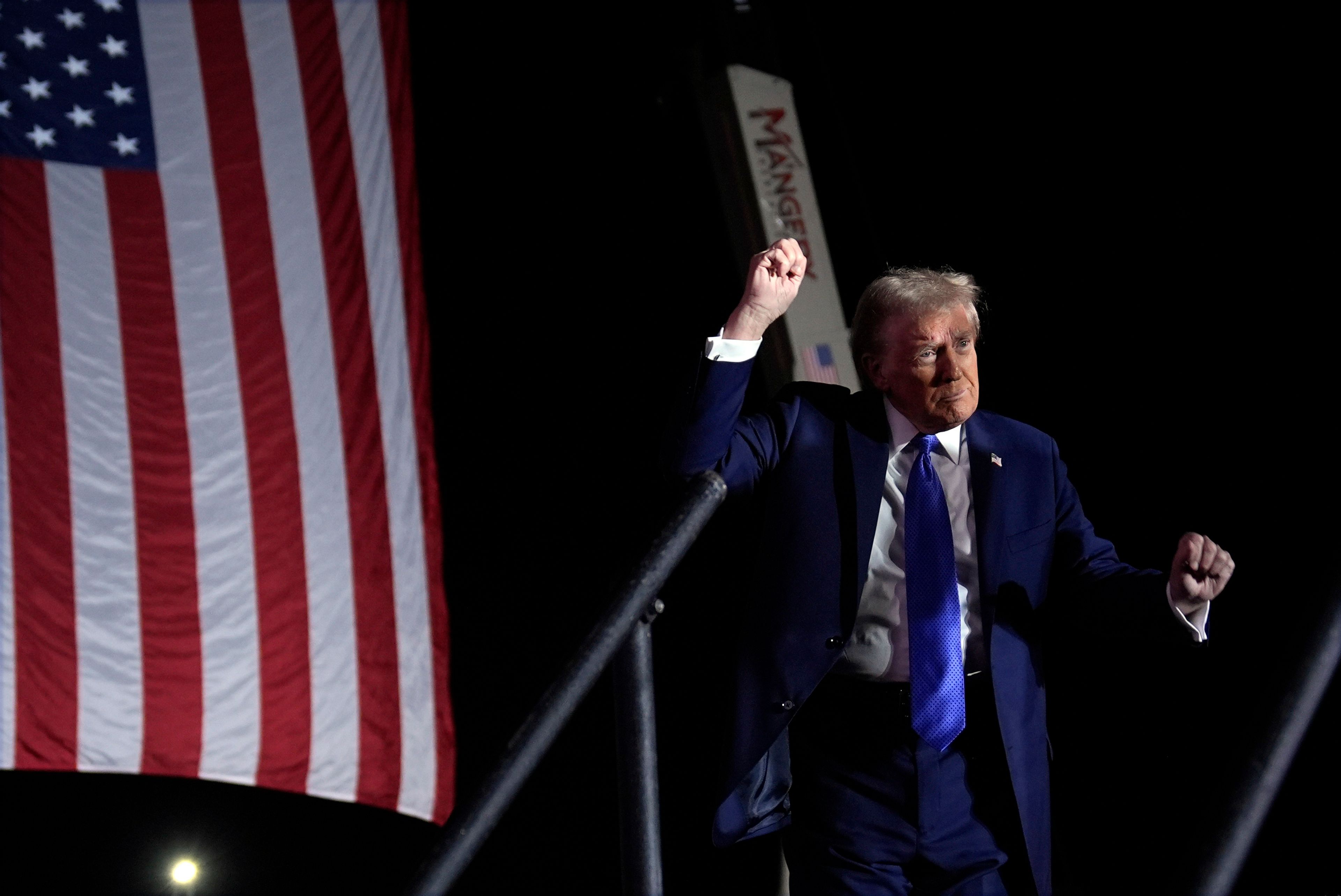 Republican presidential nominee former President Donald Trump dances at a campaign rally at Arnold Palmer Regional Airport, Saturday, Oct. 19, 2024, in Latrobe, Pa. (AP Photo/Evan Vucci)