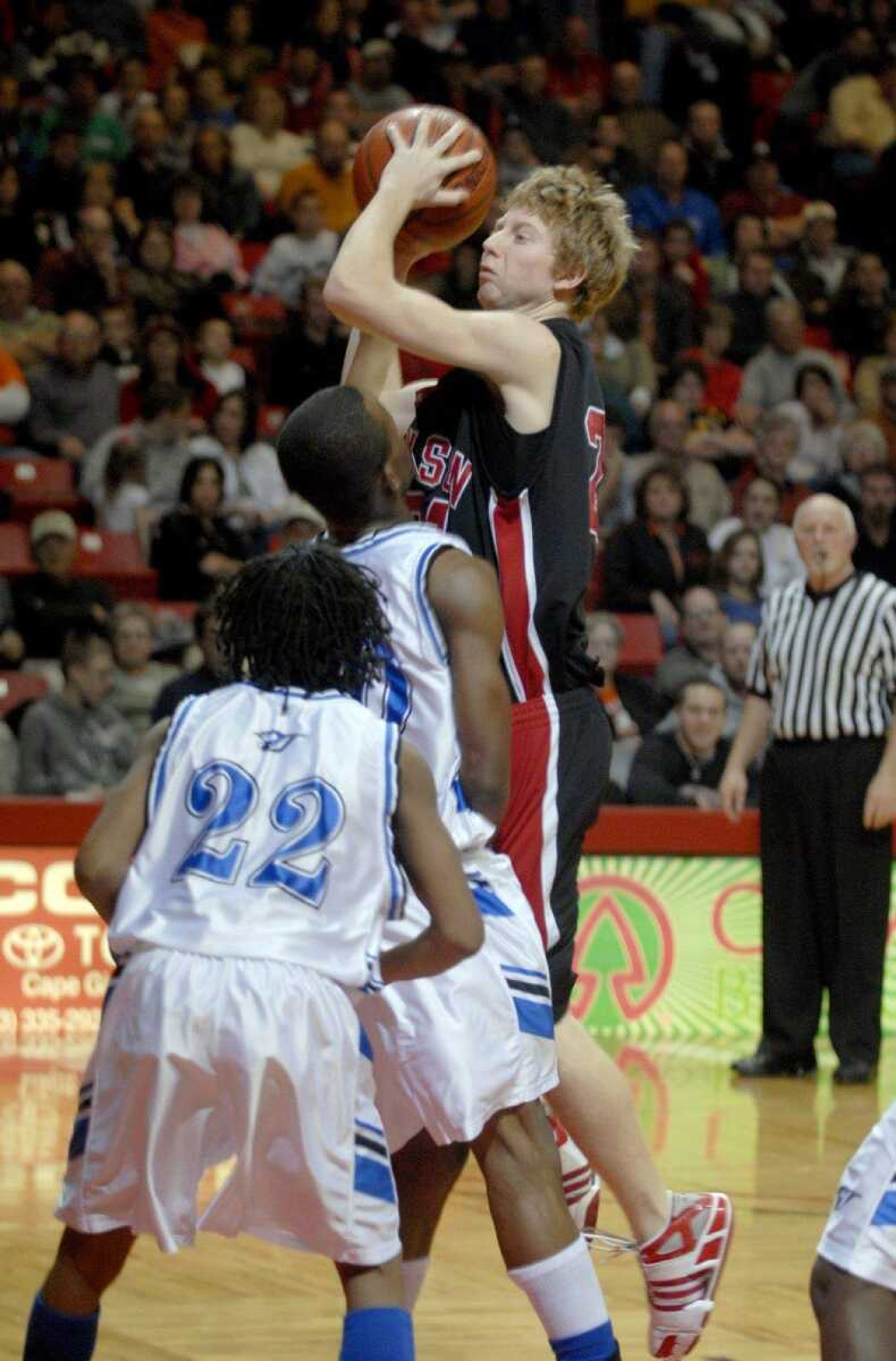 ELIZABETH DODD ~ edodd@semissourian.com
Jackson's Tyson Stoverink attempts two points in the second half against Charleston.