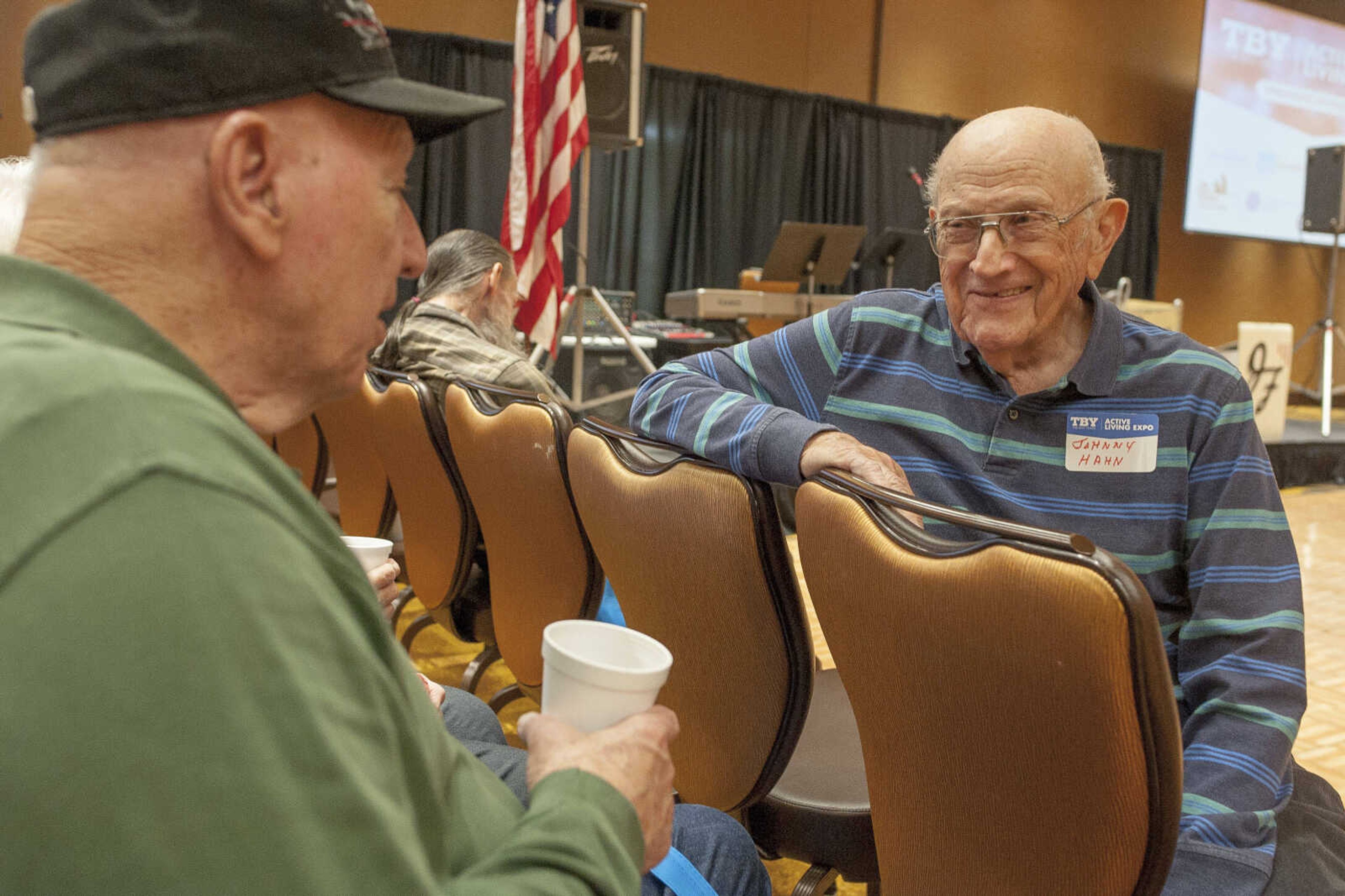 Johnny Hahn, right, socializes during the TBY Active Living Expo Wednesday, Oct. 9, 2019, at the Isle Casino in Cape Girardeau.