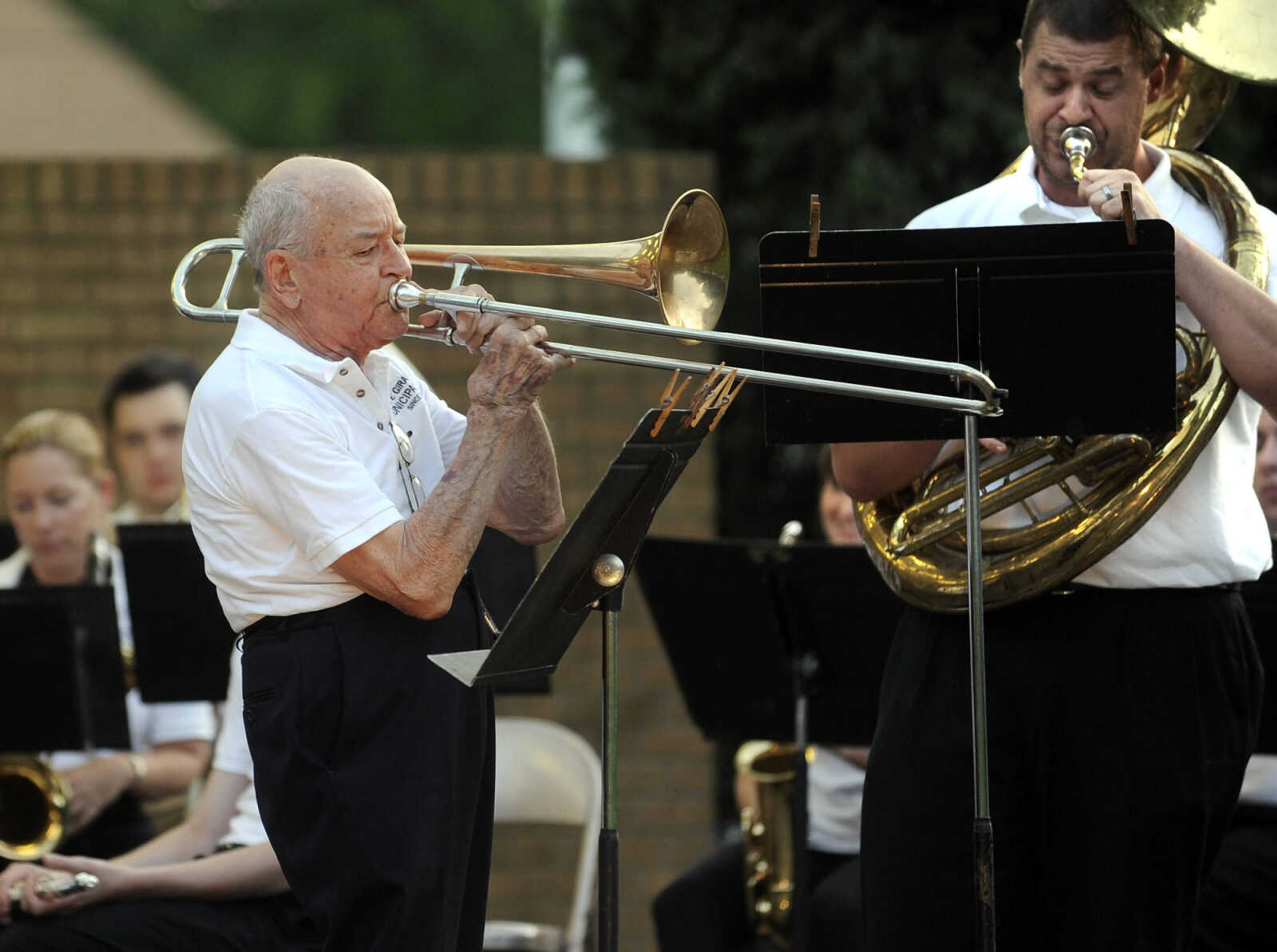 FRED LYNCH ~ flynch@semissourian.com
Dr. Dan Cotner plays his trombone in a Dixieland group with John Beaudean during the Cape Girardeau Municipal Band concert on Wednesday, June 12, 2013 at the Capaha Park bandshell.