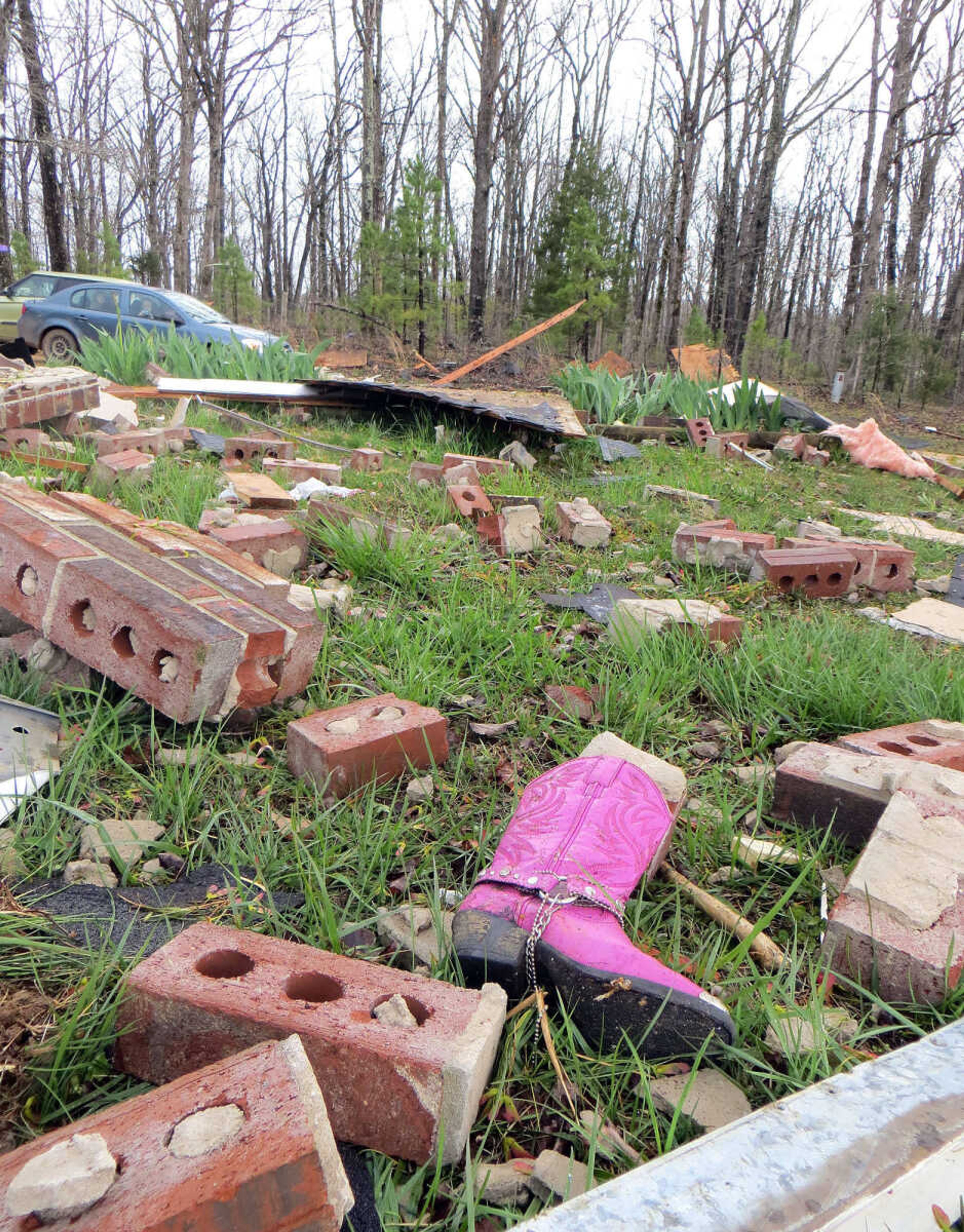 Scattered debris is seen Sunday, April 10, 2016 after an explosion destroyed the Isaac Wittenborn home Saturday night.