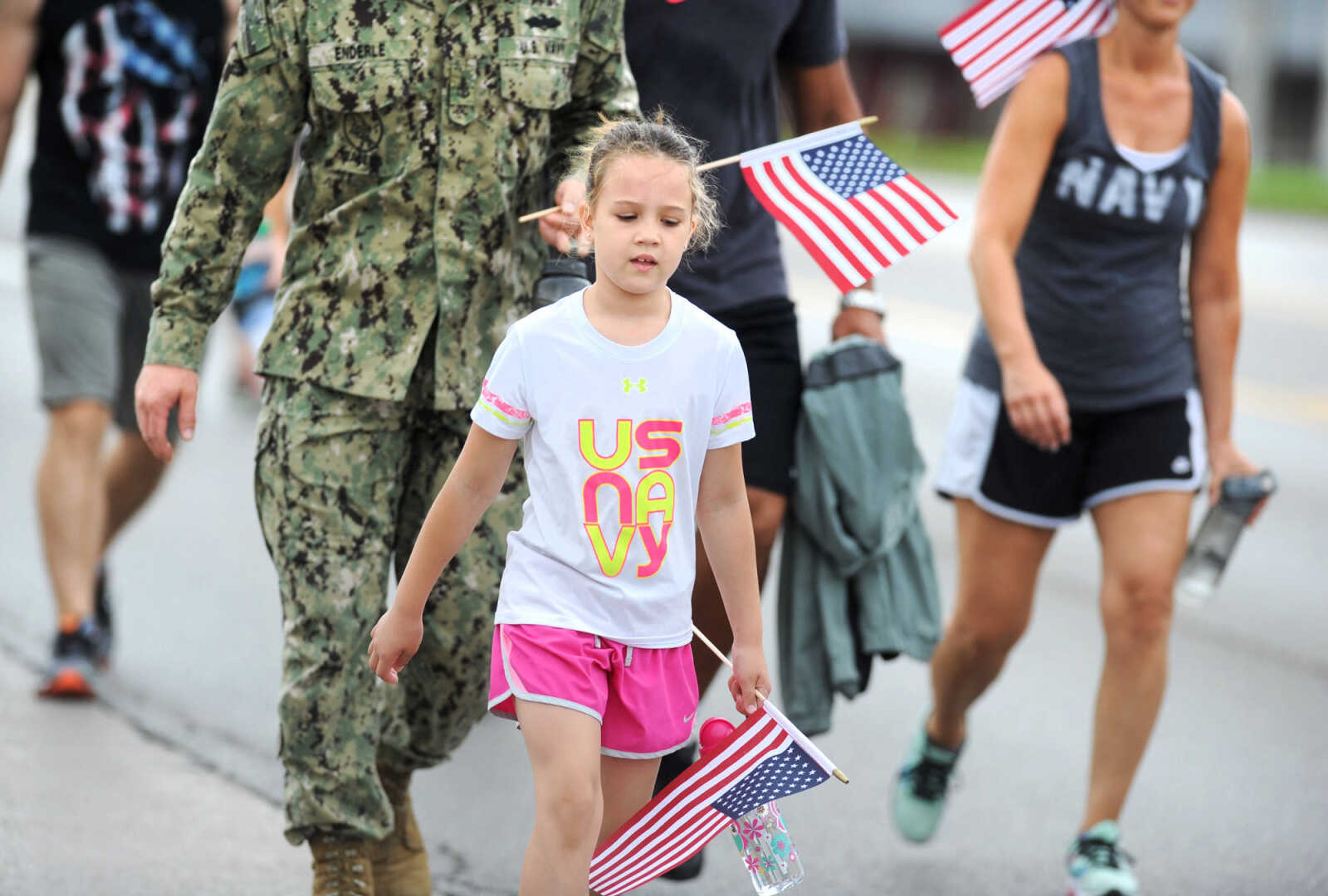 LAURA SIMON ~ lsimon@semissourian.com

Participants walk north along Kingshighway during the first ever Carry the Load event, Monday, May 25, 2015, in Cape Girardeau.