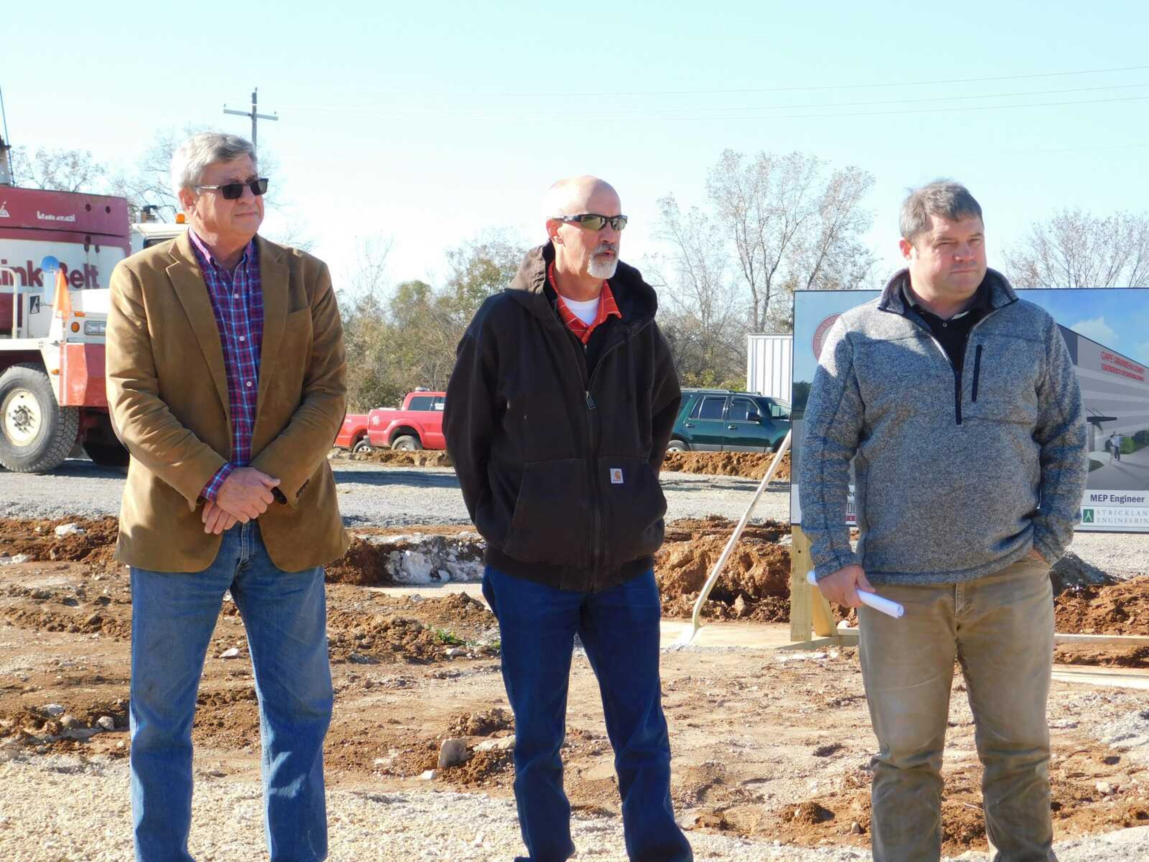 Cape Girardeau County Commissioners (from left) Paul Koeper, Charles Herbst and Clint Tracy preside over the groundbreaking for the county's future emergency operations center Friday, Nov. 3. The facility will store various important equipment for the county's emergency services personnel.